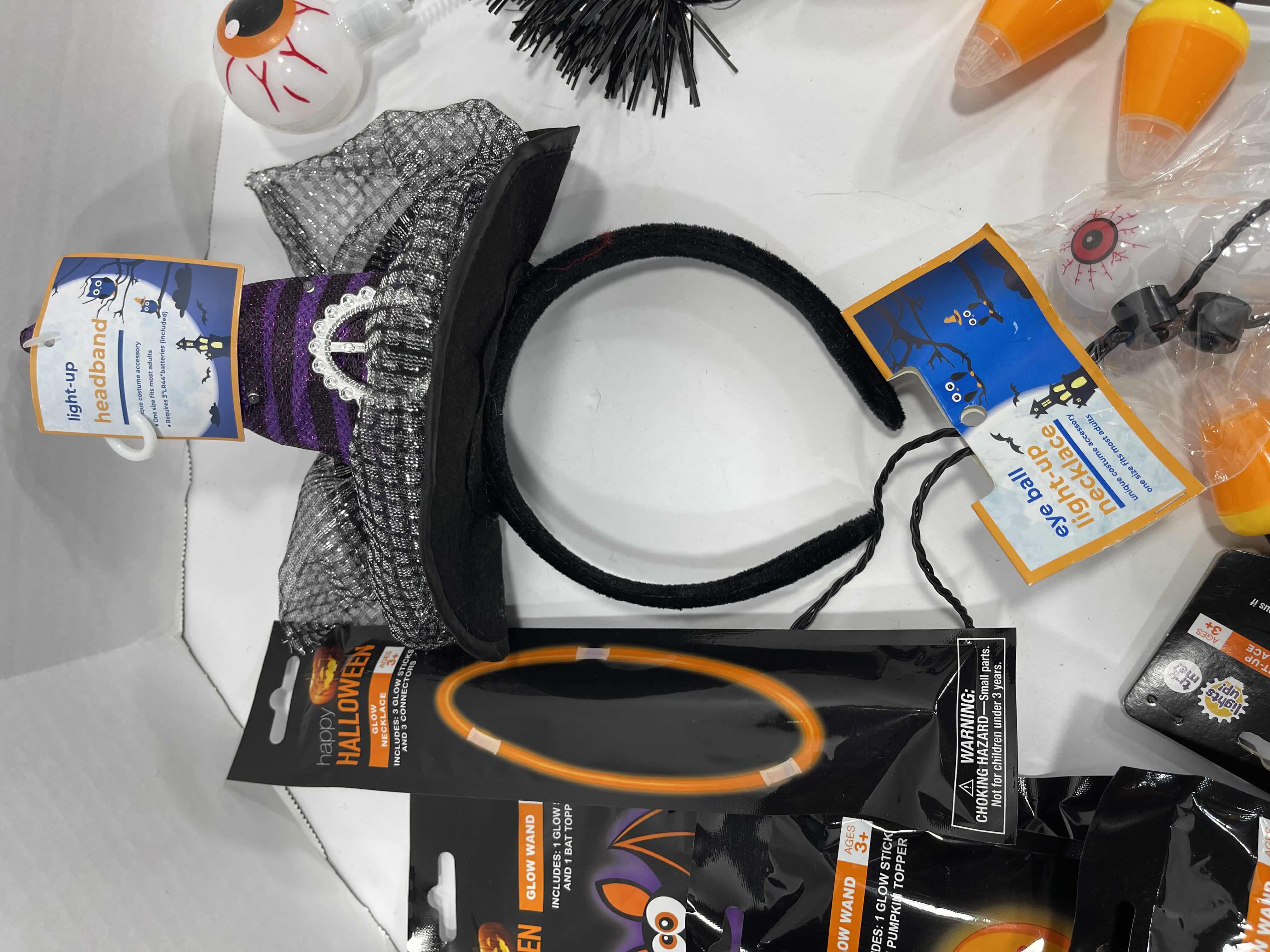 Photo 1 of HALLOWEEN LIGHT-UPS LOT (18 ITEMS) - HEADBANDS, NECKLACES, BRACELETS & GLOW WANDS MSRP $50