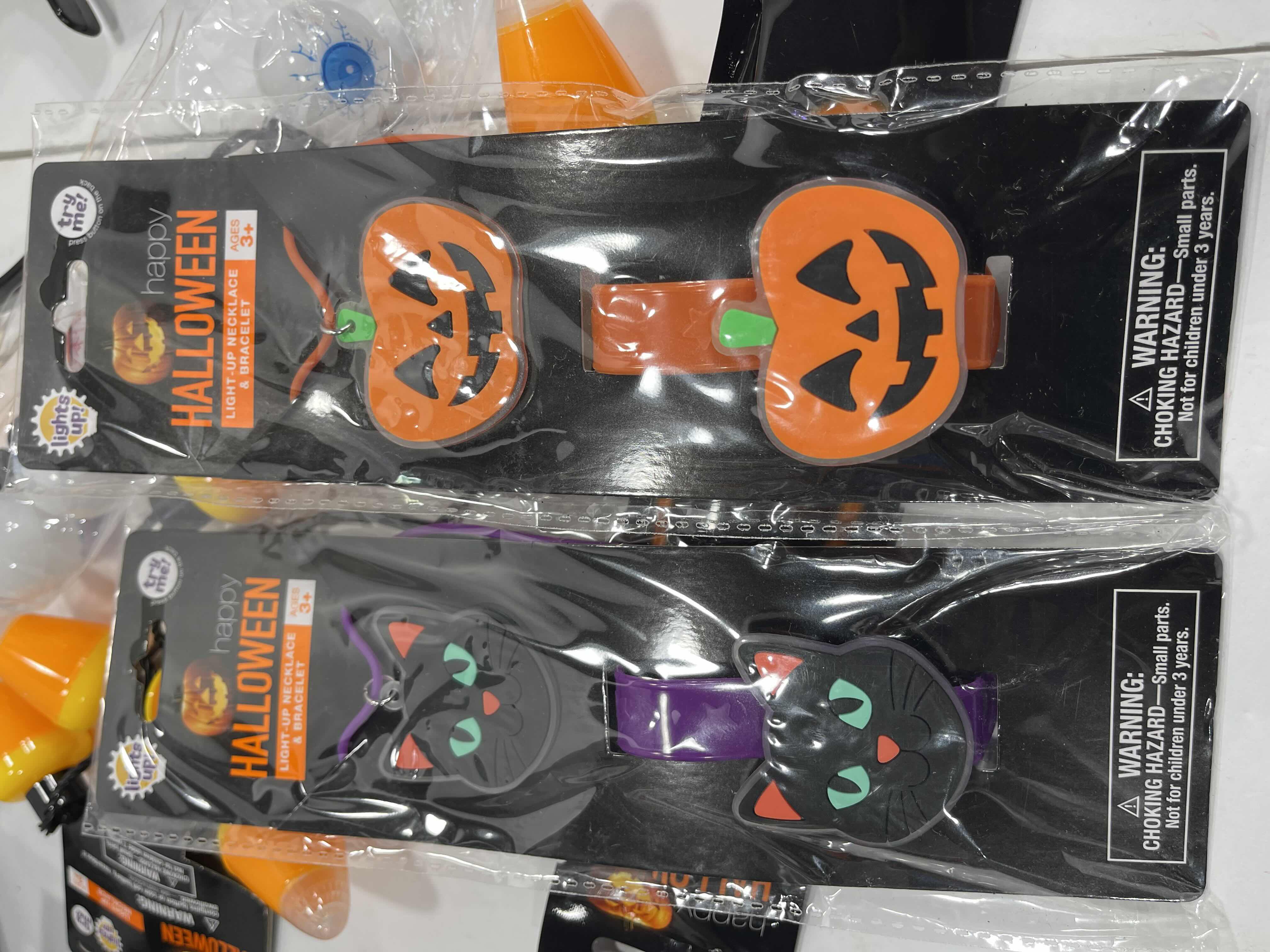 Photo 1 of HALLOWEEN LIGHT-UPS LOT (18 ITEMS) - HEADBANDS, NECKLACES, BRACELETS & GLOW WANDS MSRP $50