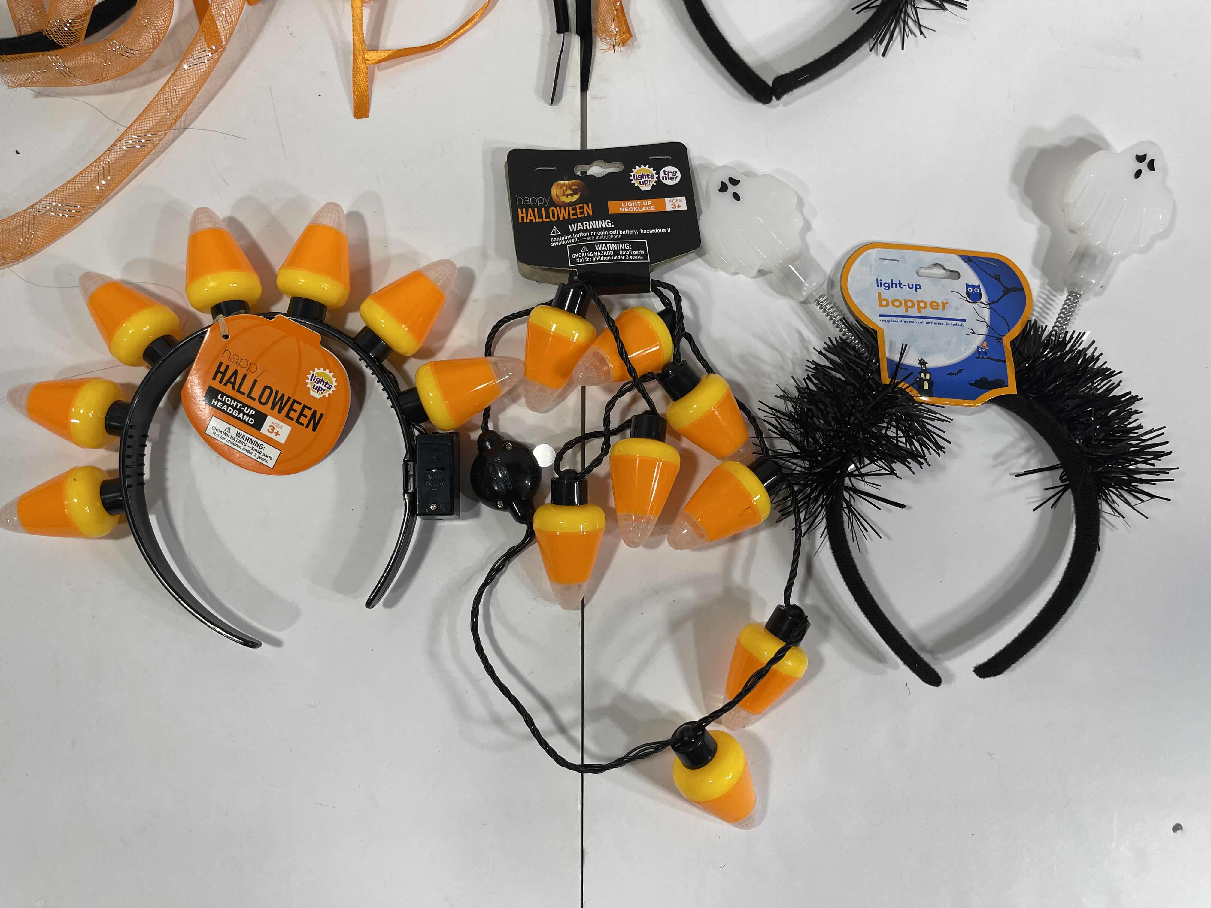 Photo 1 of HALLOWEEN LIGHT-UPS LOT (18 ITEMS) - HEADBANDS, NECKLACES & GLOW WANDS MSRP $50