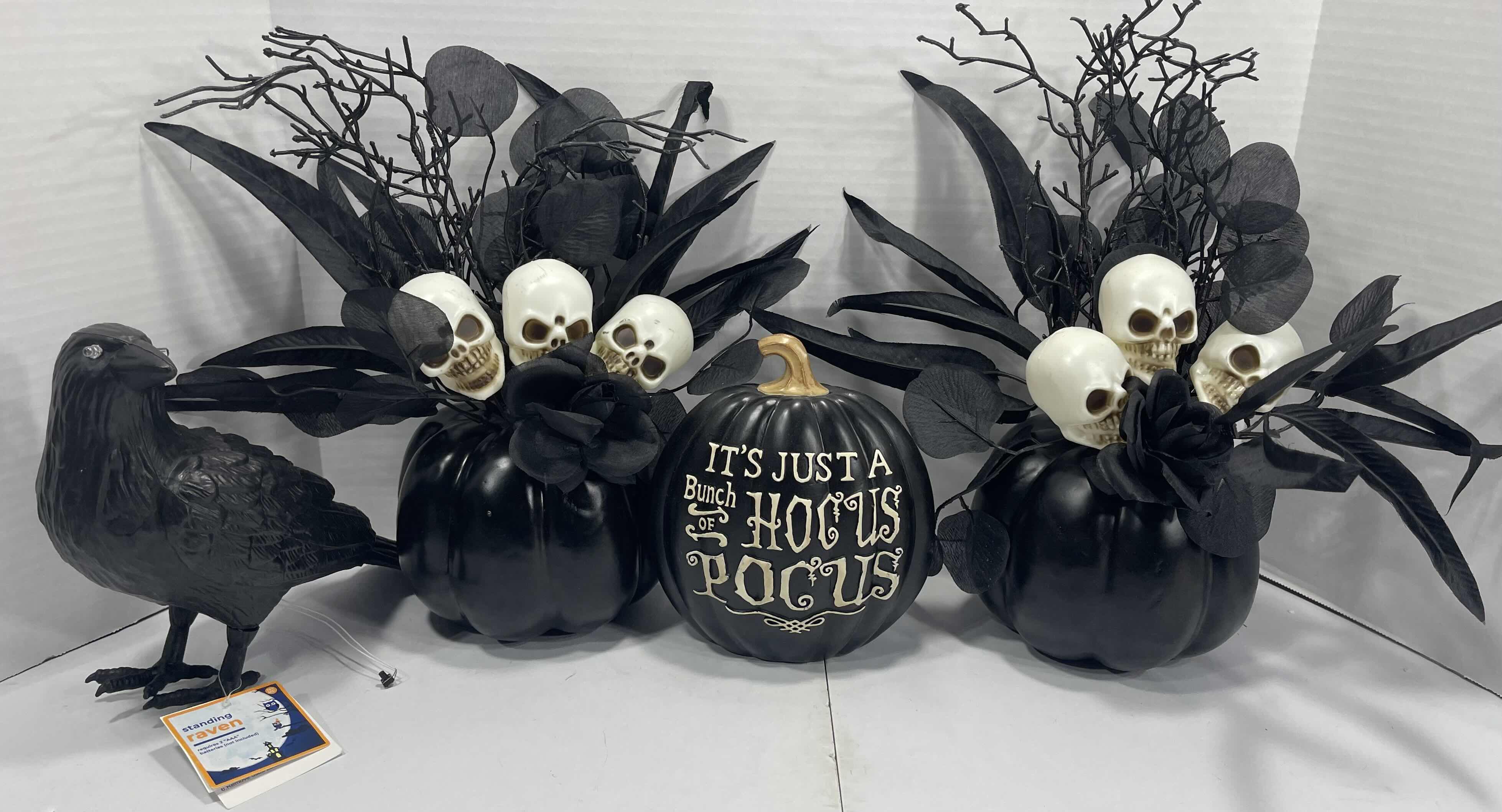 View 1 of HALLOWEEN TABLE TOP DECOR (4 ITEMS) BLACK PUMPKIN SKULL FLOWER ARRANGEMENT (2), IT’S ALL JUST HOCUS POCUS PUMPKIN & LIGHT-UP EYES RAVEN