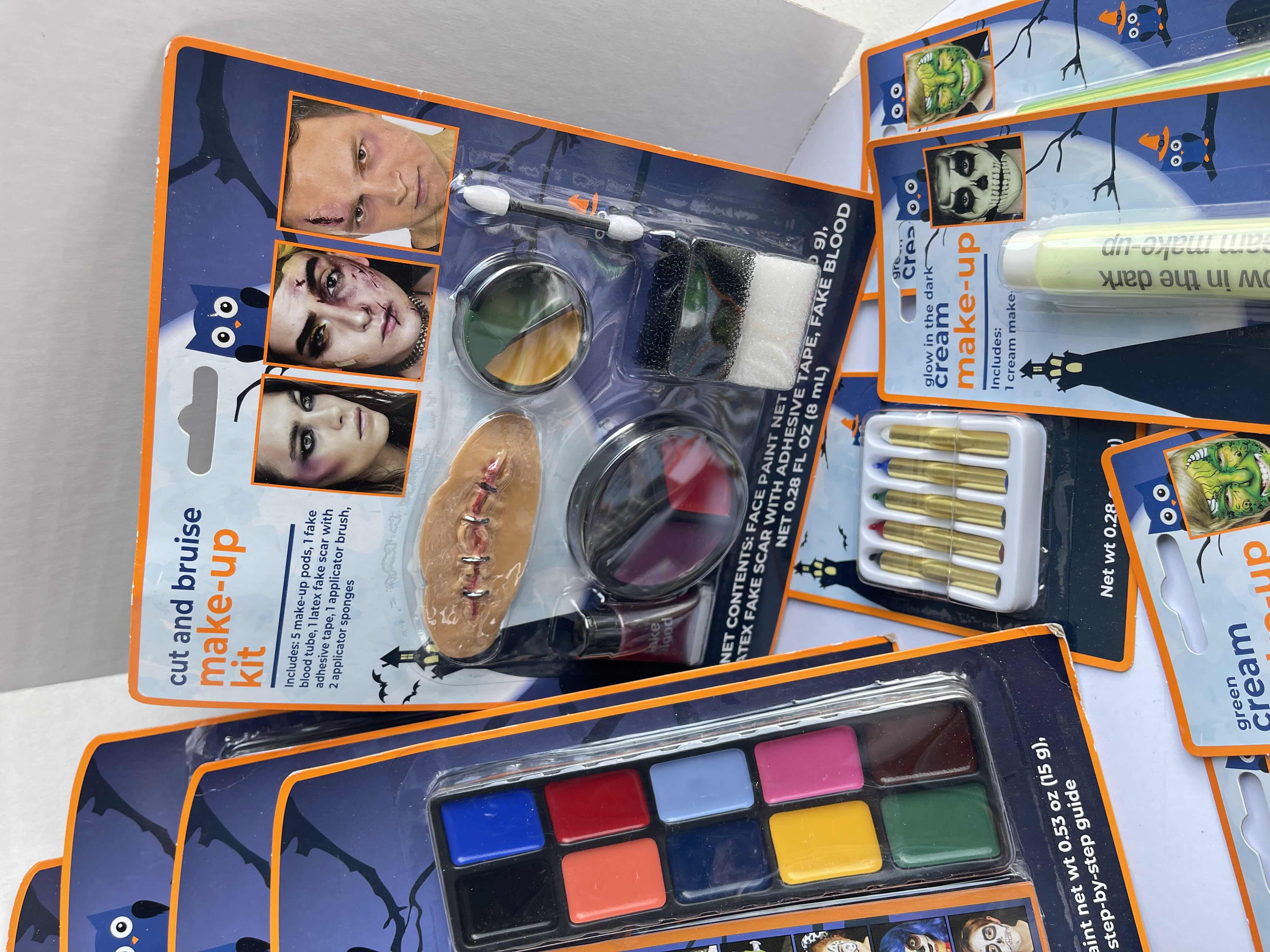 Photo 1 of EXTRA-LARGE LOT ASSORTMENT OF HALLOWEEN MAKE-UP KITS, FACE PAINTS, FAKE BLOOD AND MORE (BOX OF 100 PIECES) MSRP $400