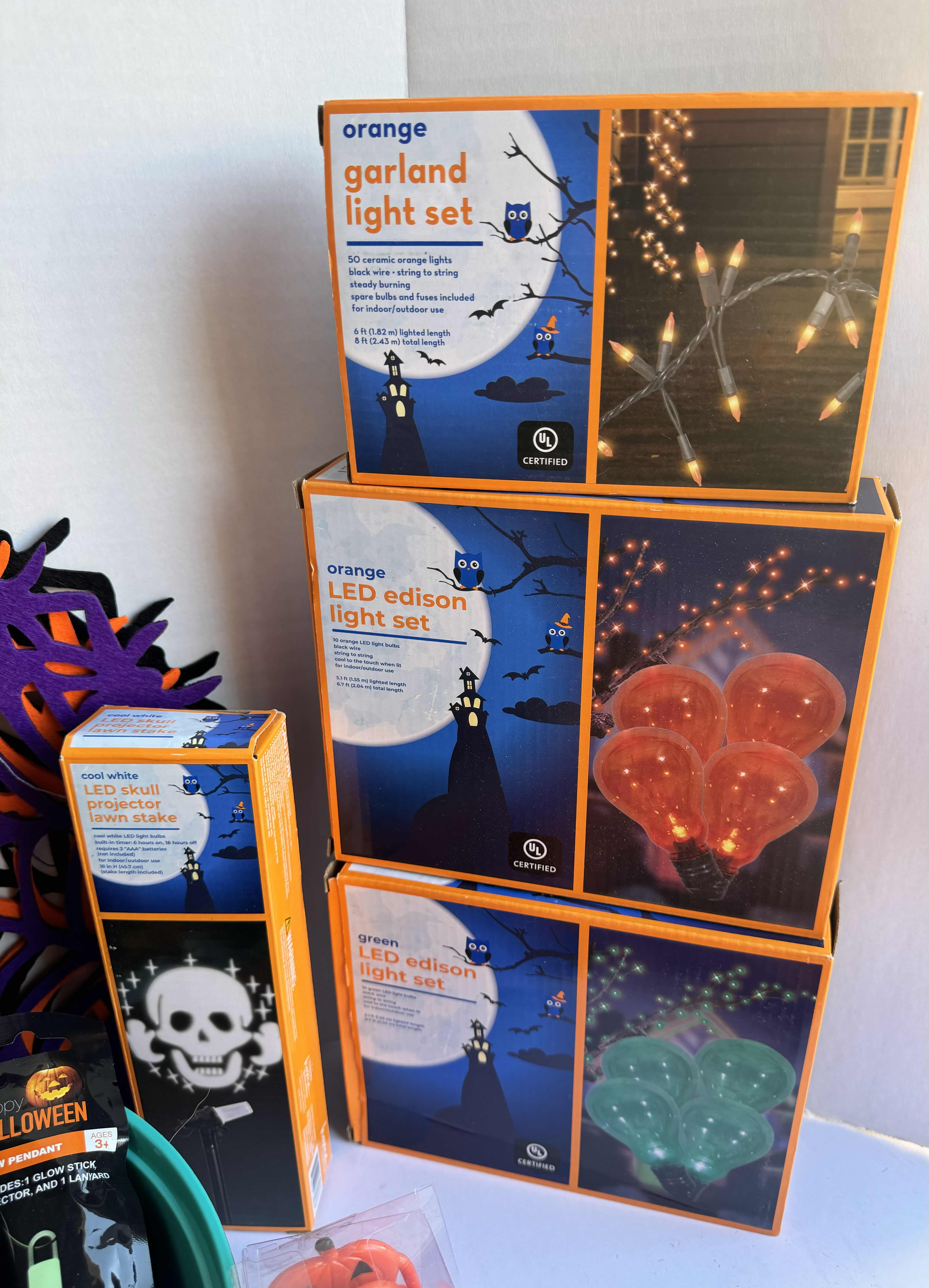 Photo 1 of HALLOWEEN TABLE TOP DECOR LARGE ASSORTMENT - CANDY BOWLS, LIGHT SETS, GLOW STICKS, HALLOWEEN CUPS, AND MORE MSRP $70