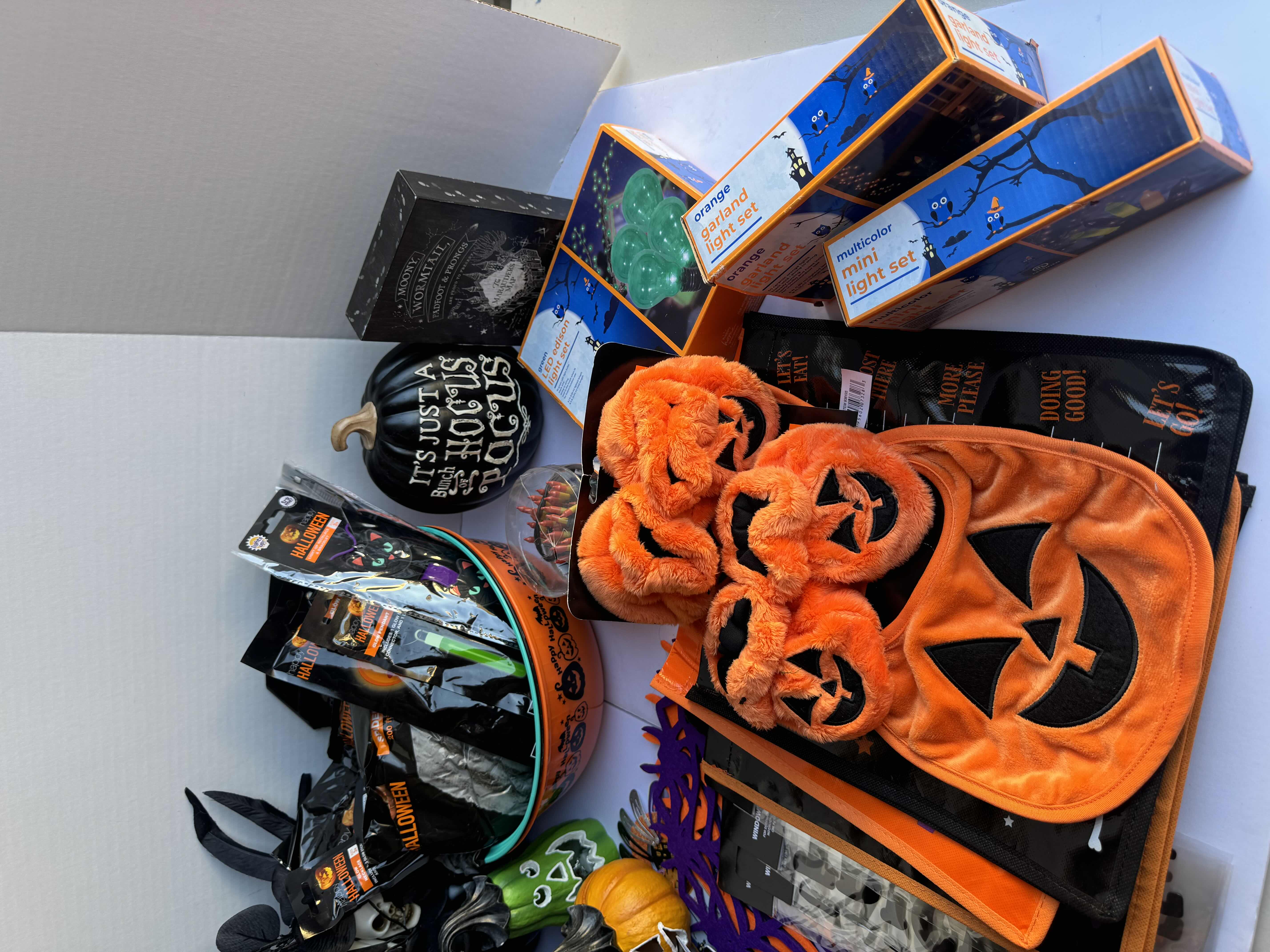 Photo 1 of HALLOWEEN TABLE TOP DECOR LARGE ASSORTMENT - CANDY BOWLS, LIGHT SETS, GLOW STICKS, ANIMATED BOOK DISPLAY, WOOD DISPLAYS, CERAMIC PUMPKINS AND MORE MSRP $70
