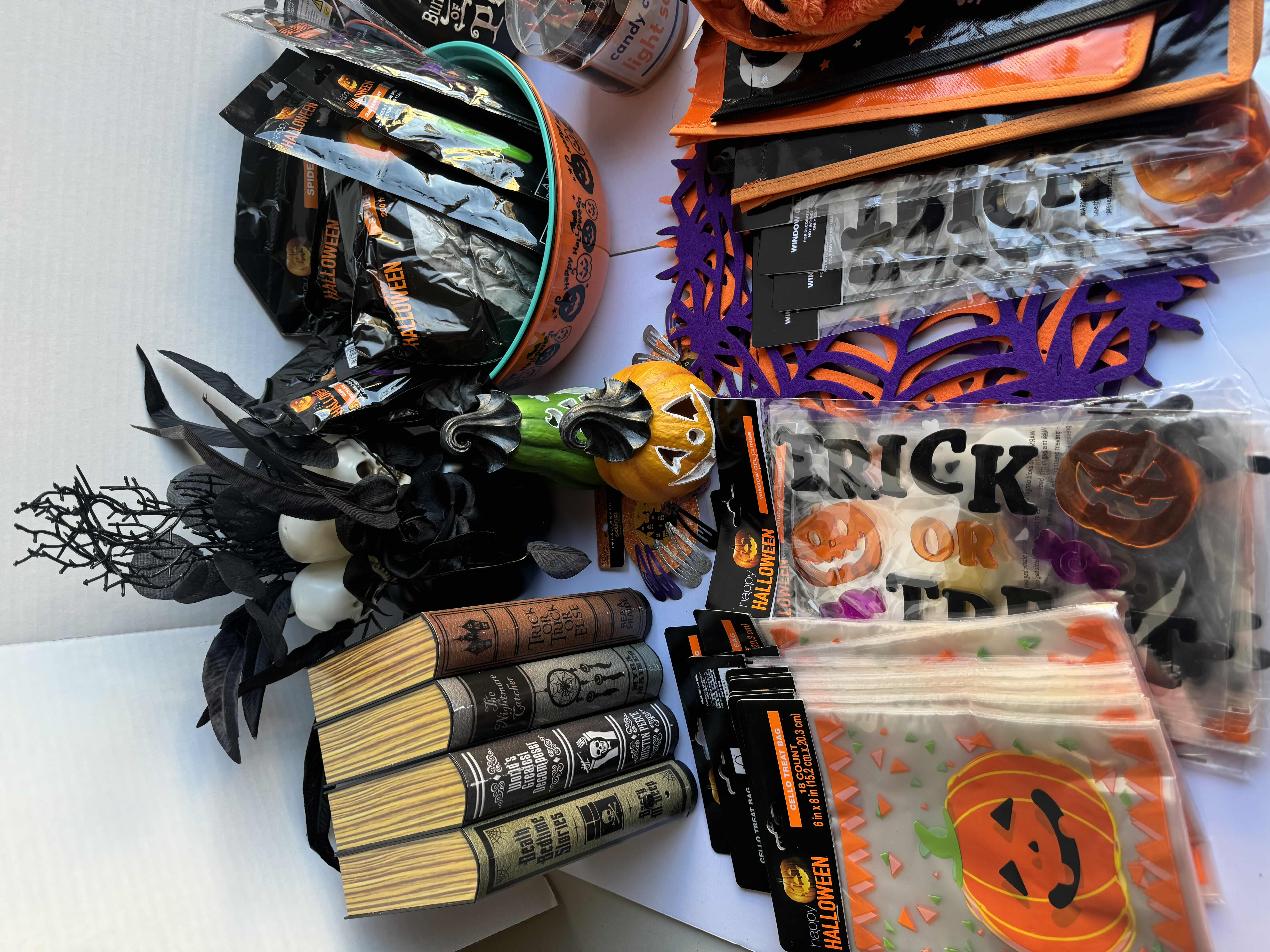Photo 1 of HALLOWEEN TABLE TOP DECOR LARGE ASSORTMENT - CANDY BOWLS, LIGHT SETS, GLOW STICKS, ANIMATED BOOK DISPLAY, WOOD DISPLAYS, CERAMIC PUMPKINS AND MORE MSRP $70