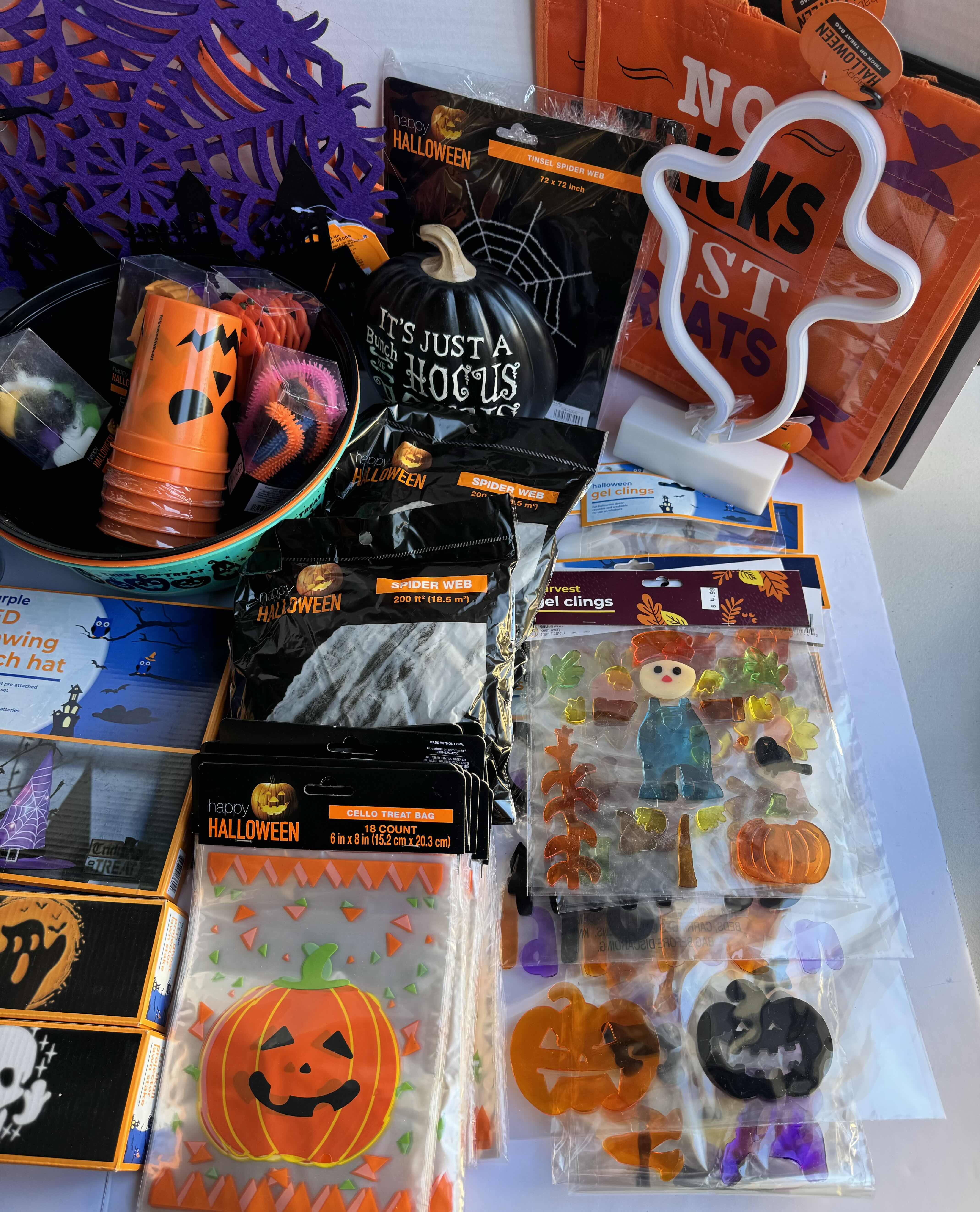 Photo 1 of HALLOWEEN TABLE TOP DECOR LARGE ASSORTMENT - CANDY BOWLS, LIGHT SETS, GLOW STICKS, HALLOWEEN CUPS, WOOD DISPLAYS, RESIN PUMPKINS AND MORE MSRP $70