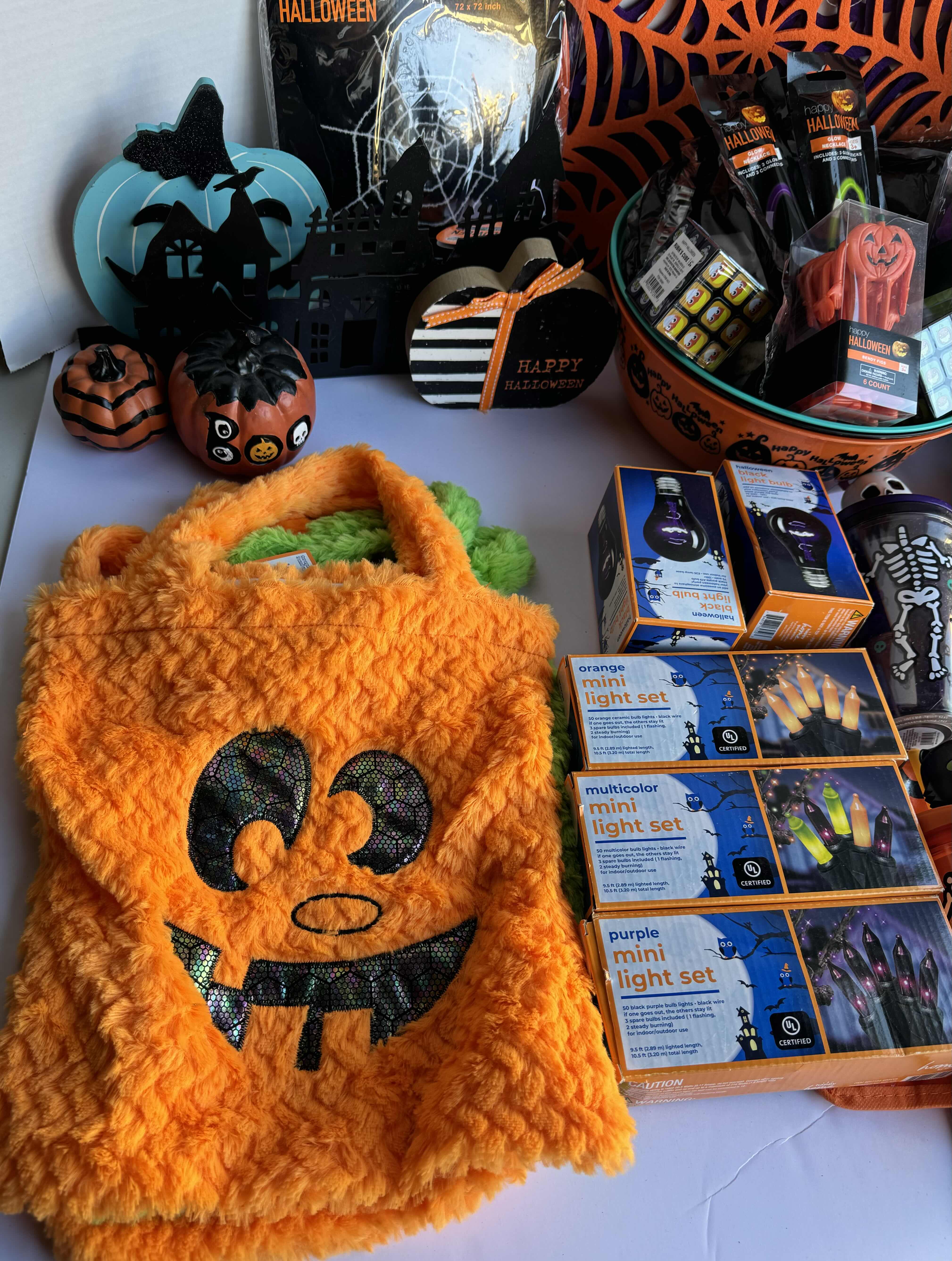 Photo 1 of HALLOWEEN TABLE TOP DECOR LARGE ASSORTMENT - CANDY BOWLS, LIGHT SETS, GLOW STICKS, HALLOWEEN CUPS, WOOD DISPLAYS, RESIN PUMPKINS AND MORE MSRP $70