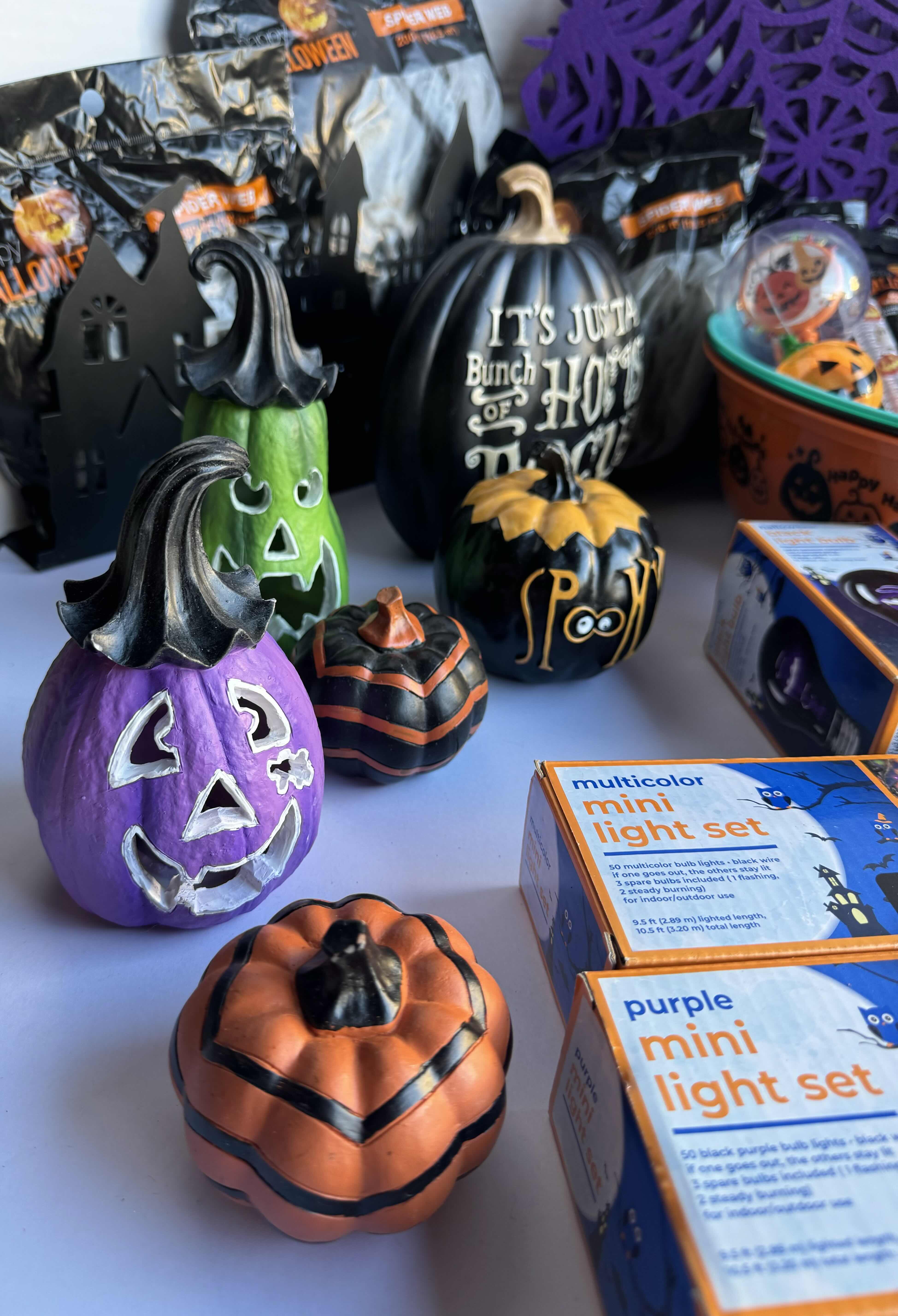 Photo 1 of HALLOWEEN TABLE TOP DECOR LARGE ASSORTMENT - CANDY BOWLS, LIGHT SETS, GLOW STICKS, HALLOWEEN CUPS, WOOD DISPLAYS, RESIN PUMPKINS, TOYS AND MORE MSRP $70