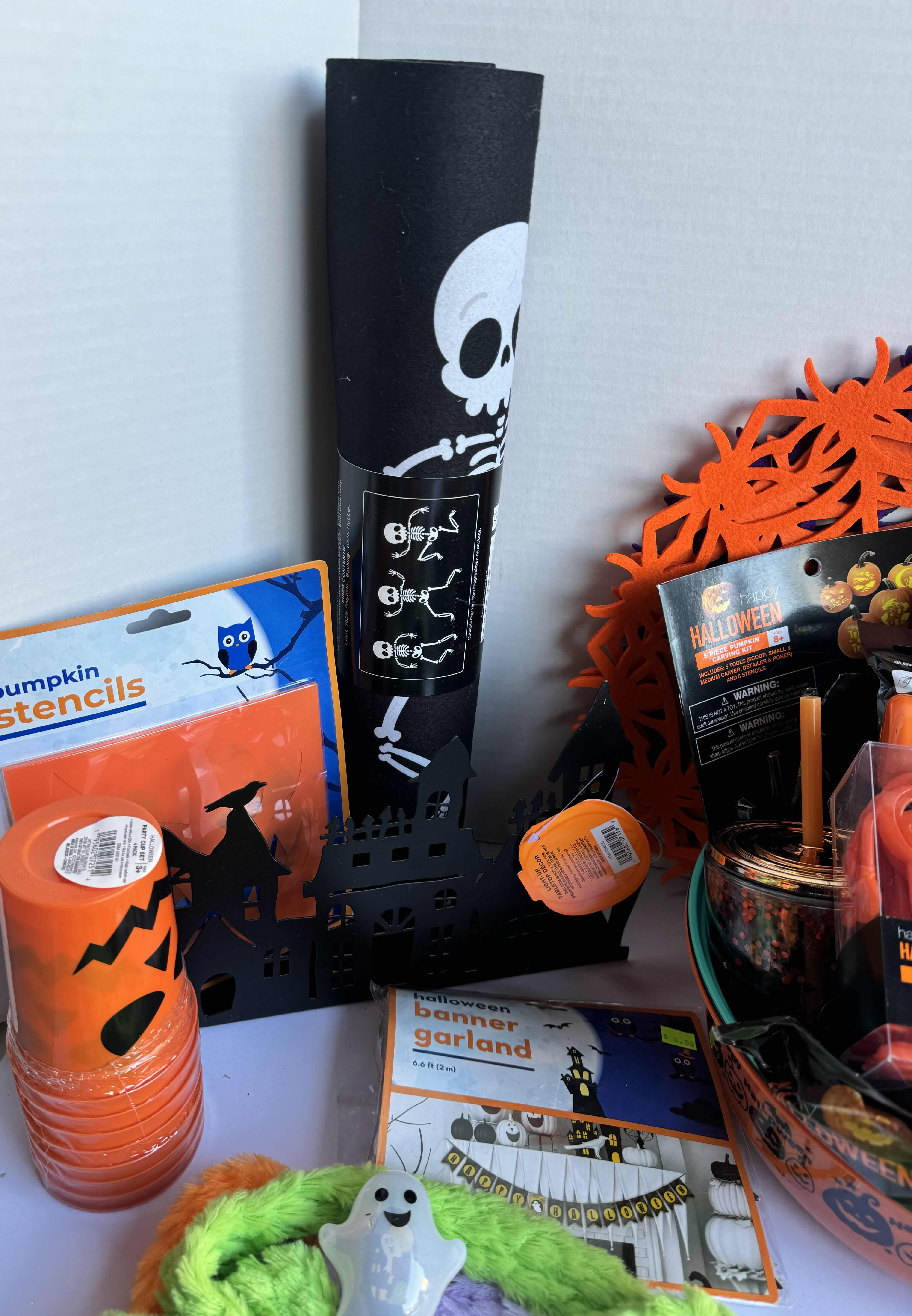 Photo 1 of HALLOWEEN TABLE TOP DECOR LARGE ASSORTMENT - CANDY BOWLS, LIGHT SETS, GLOW STICKS, HALLOWEEN CUPS, MATTS, RESIN PUMPKINS AND MORE MSRP $70