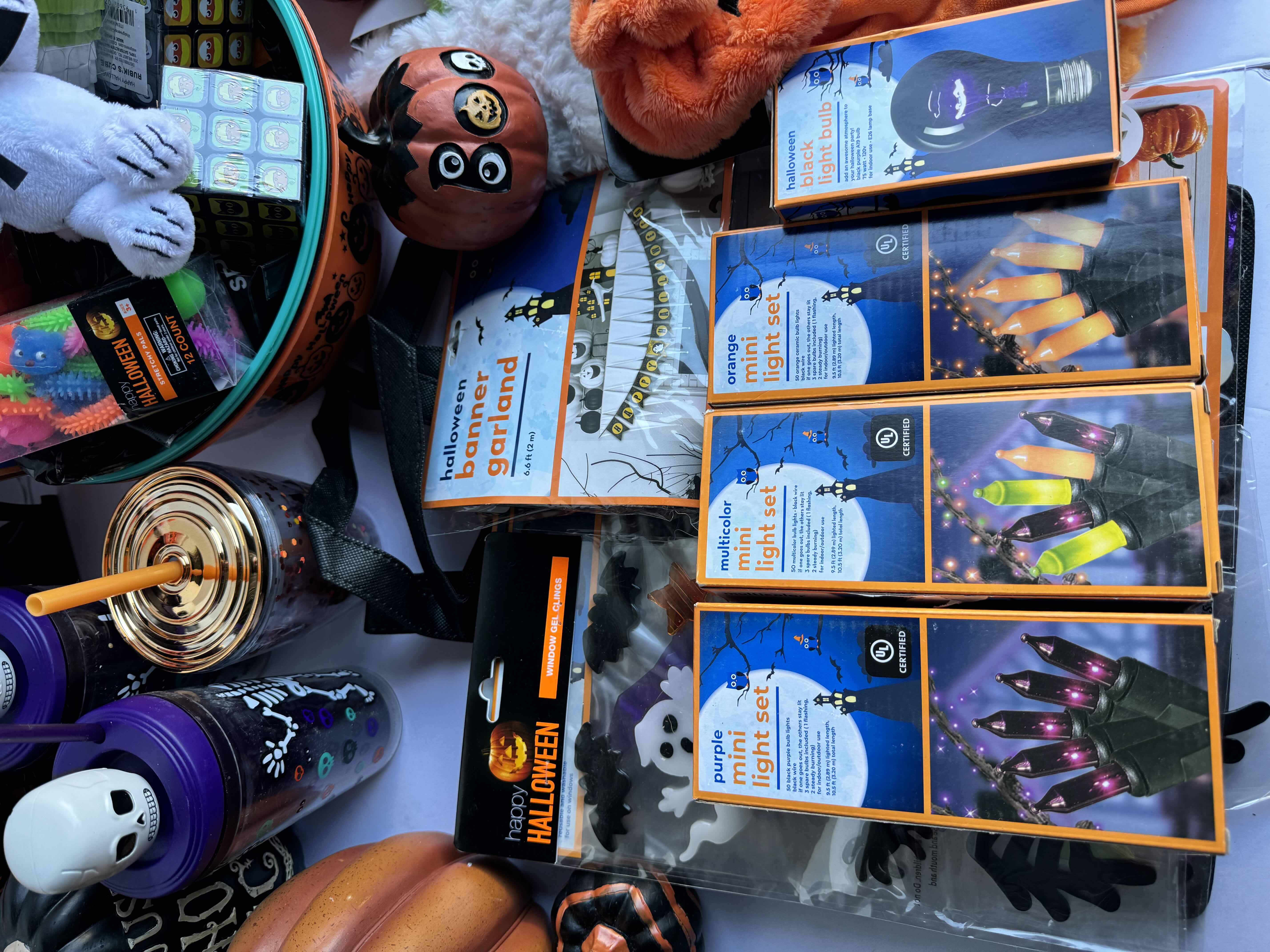 Photo 1 of HALLOWEEN TABLE TOP DECOR LARGE ASSORTMENT - CANDY BOWLS, LIGHT SETS, GLOW STICKS, HALLOWEEN CUPS, WOOD DISPLAYS, RESIN PUMPKINS, TOYS AND MORE MSRP $70