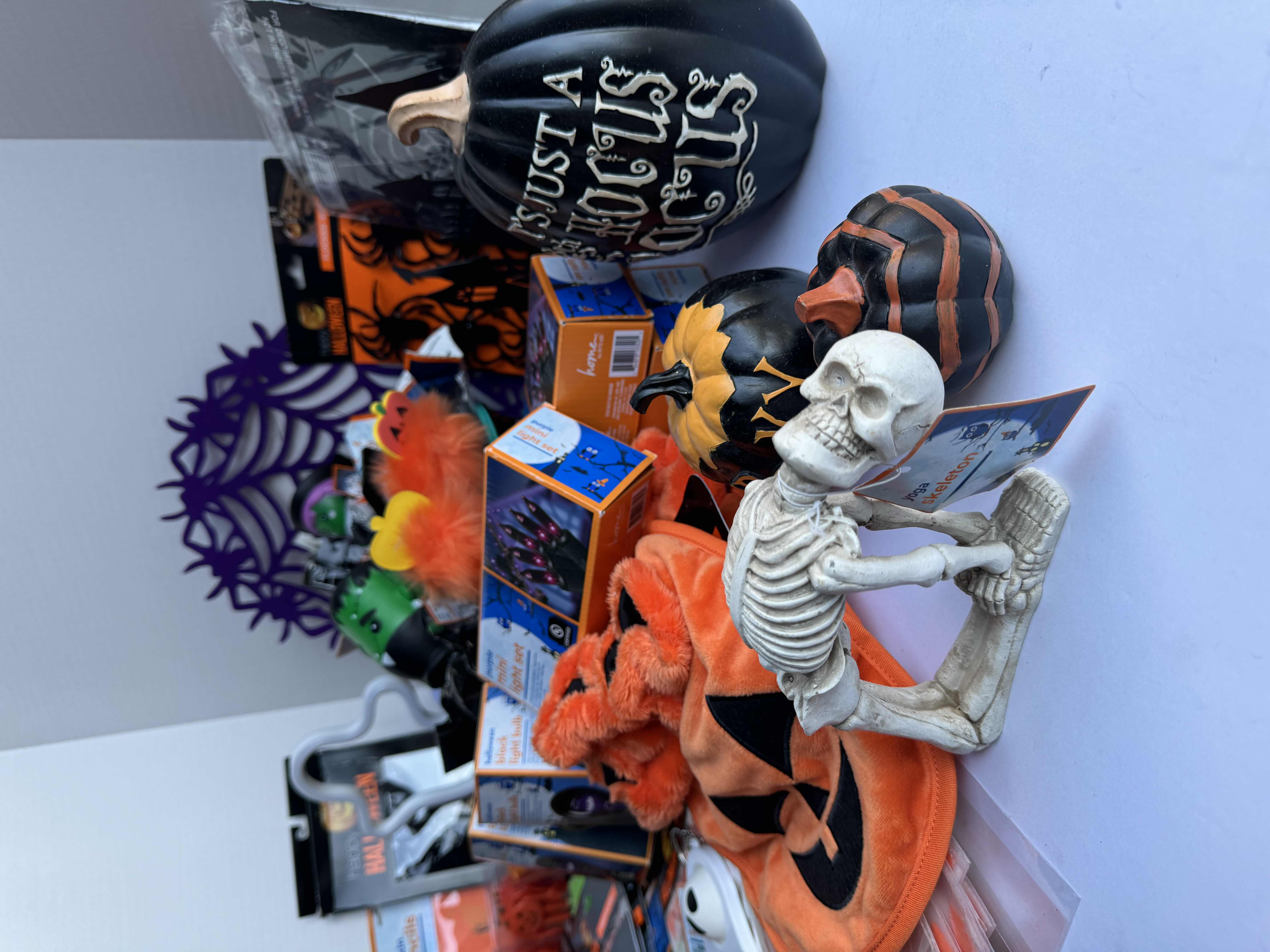 Photo 1 of HALLOWEEN TABLE TOP DECOR LARGE ASSORTMENT - CANDY BOWLS, LIGHT SETS, GLOW STICKS, HALLOWEEN CUPS, WOOD DISPLAYS, RESIN PUMPKINS, TOYS AND MORE MSRP $70
