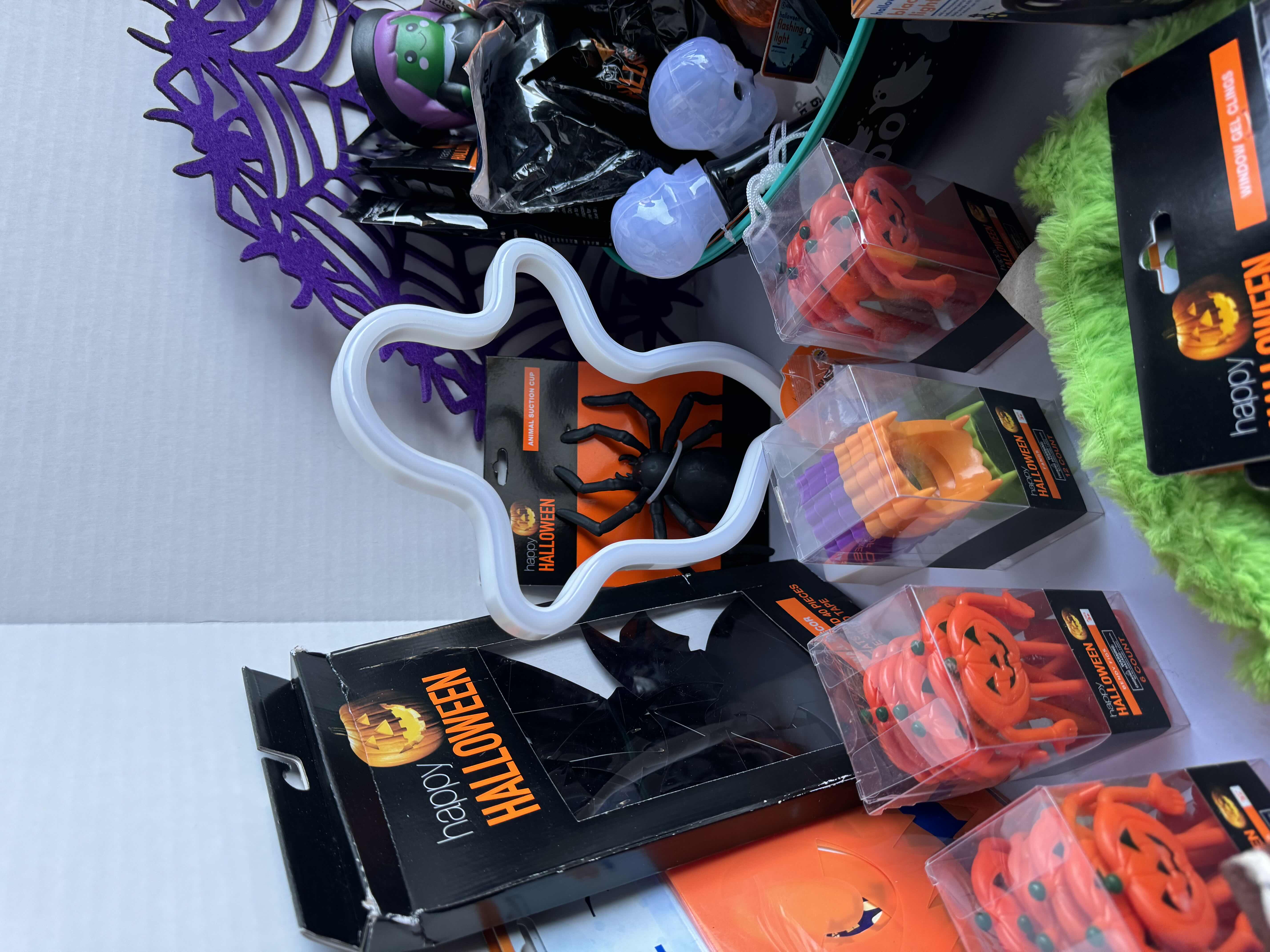 Photo 1 of HALLOWEEN TABLE TOP DECOR LARGE ASSORTMENT - CANDY BOWLS, LIGHT SETS, GLOW STICKS, HALLOWEEN CUPS, WOOD DISPLAYS, RESIN PUMPKINS, TOYS AND MORE MSRP $70