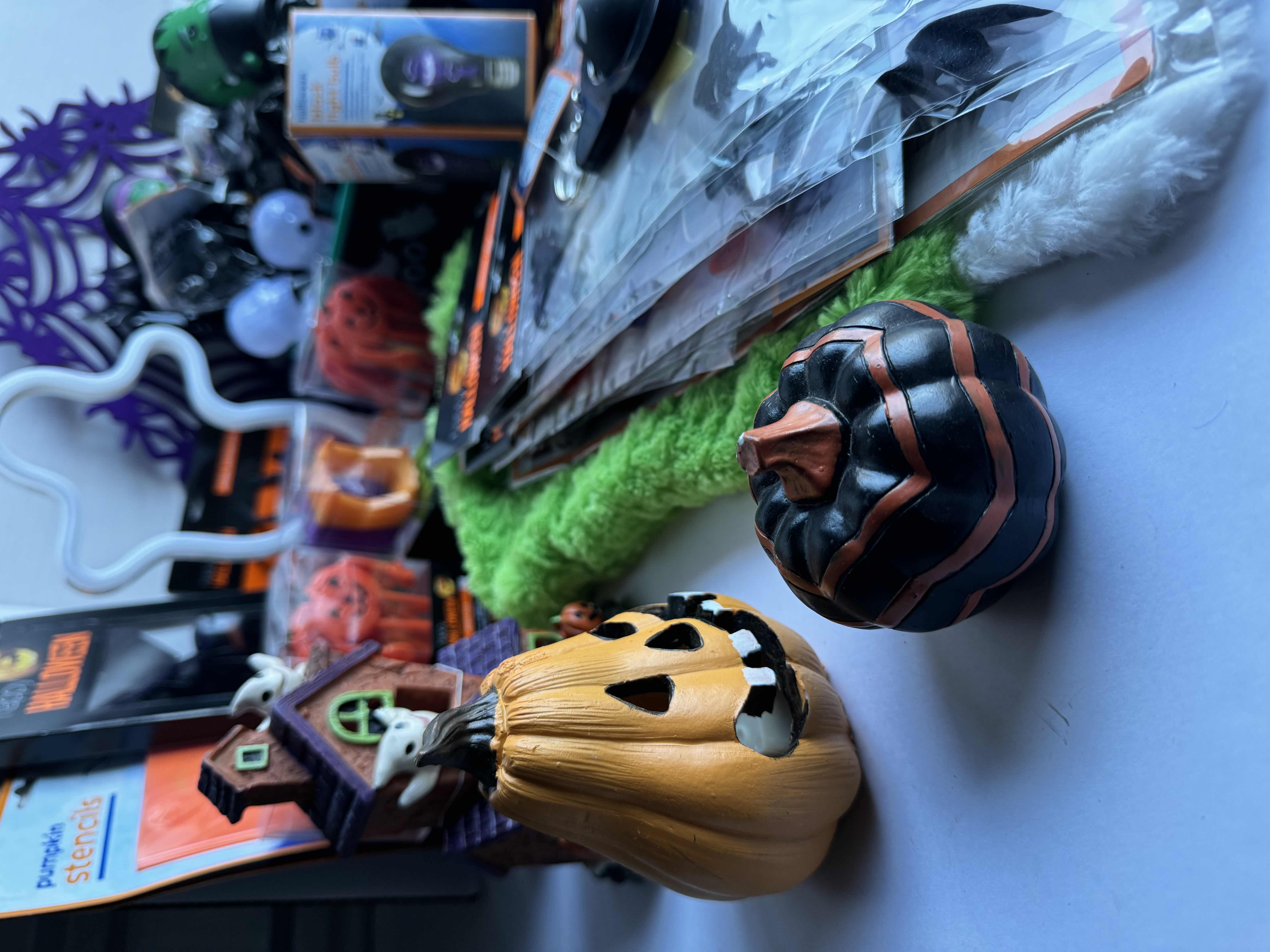 Photo 1 of HALLOWEEN TABLE TOP DECOR LARGE ASSORTMENT - CANDY BOWLS, LIGHT SETS, GLOW STICKS, HALLOWEEN CUPS, WOOD DISPLAYS, RESIN PUMPKINS, TOYS AND MORE MSRP $70
