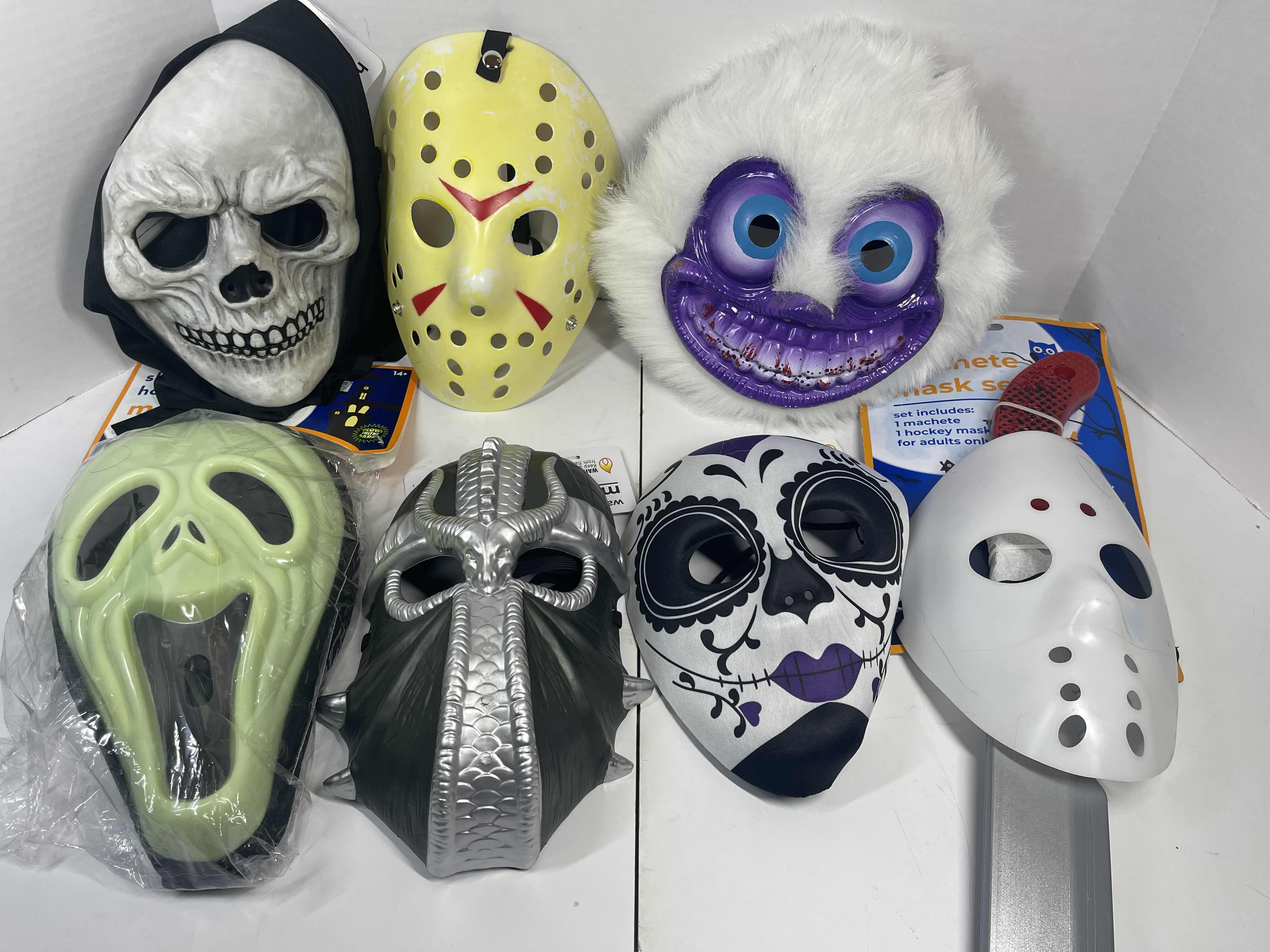 Photo 1 of HALLOWEEN PLASTIC MASKS (7) ONE SIZE FITS MOST ADULTS