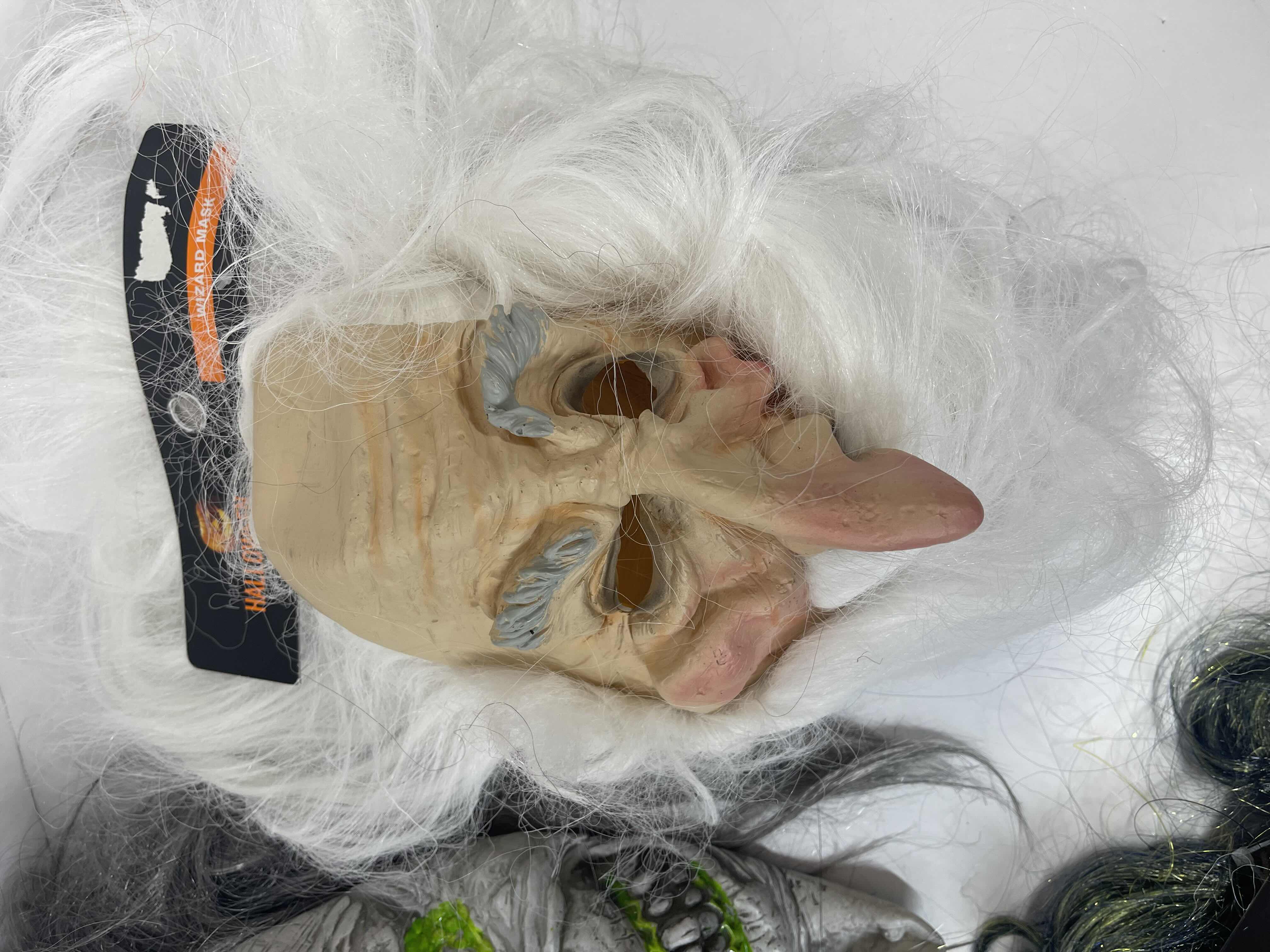 Photo 1 of HALLOWEEN RUBBER MASKS WITH HAIR (5) ONE SIZE FITS MOST ADULTS MSRP $80