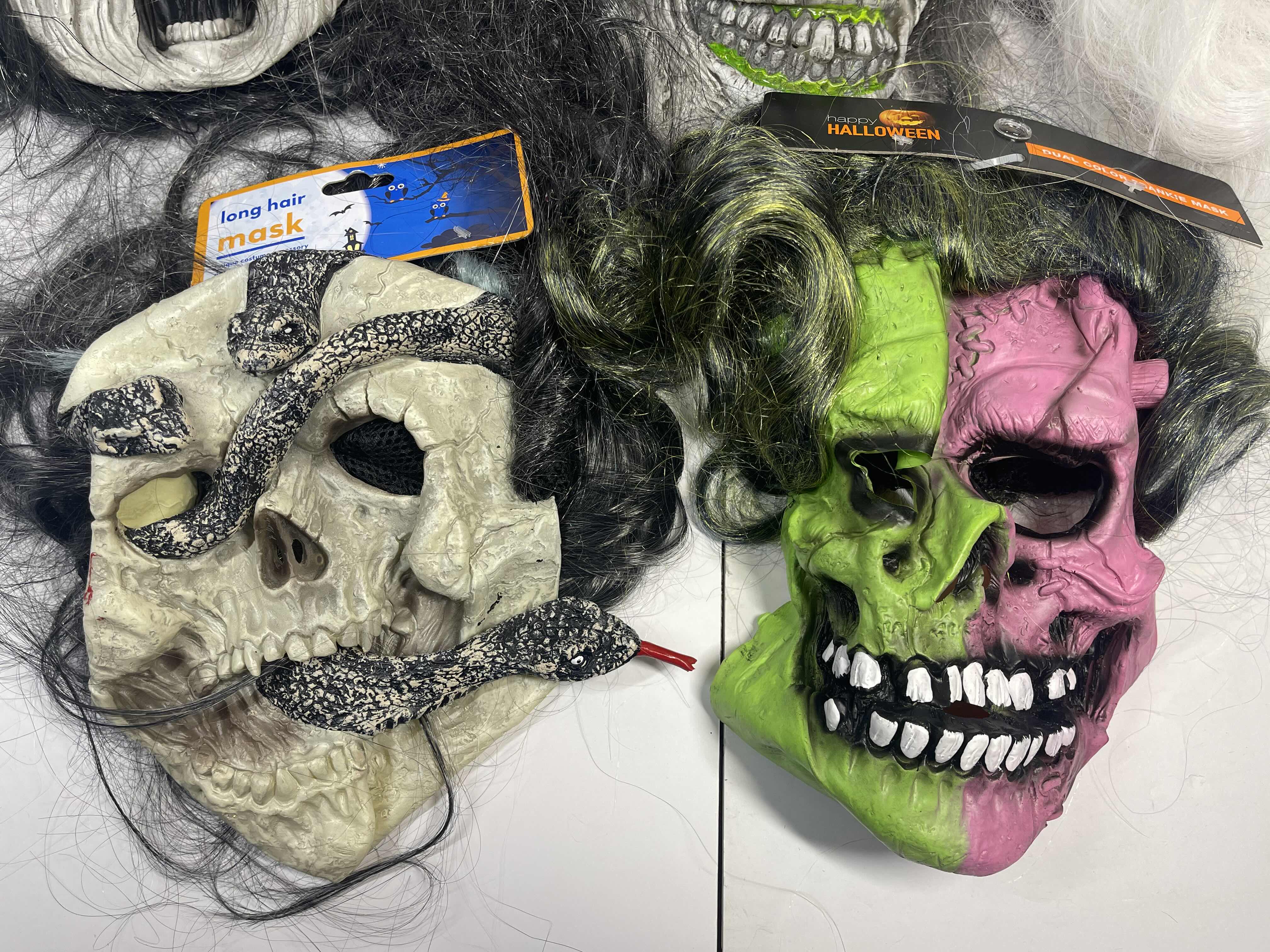 Photo 1 of HALLOWEEN RUBBER MASKS WITH HAIR (5) ONE SIZE FITS MOST ADULTS MSRP $80