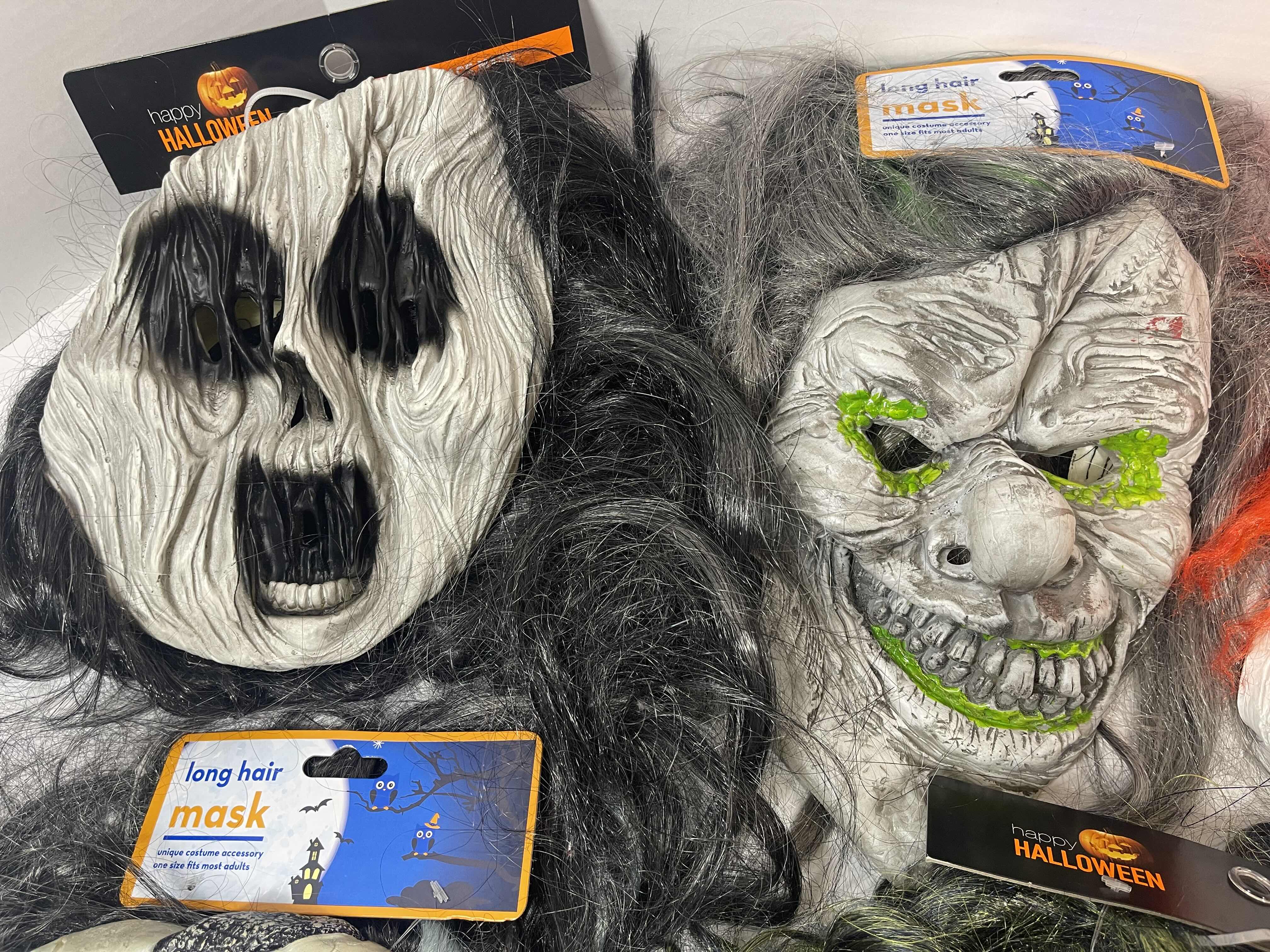 Photo 1 of HALLOWEEN RUBBER MASKS WITH HAIR (5) ONE SIZE FITS MOST ADULTS MSRP $80