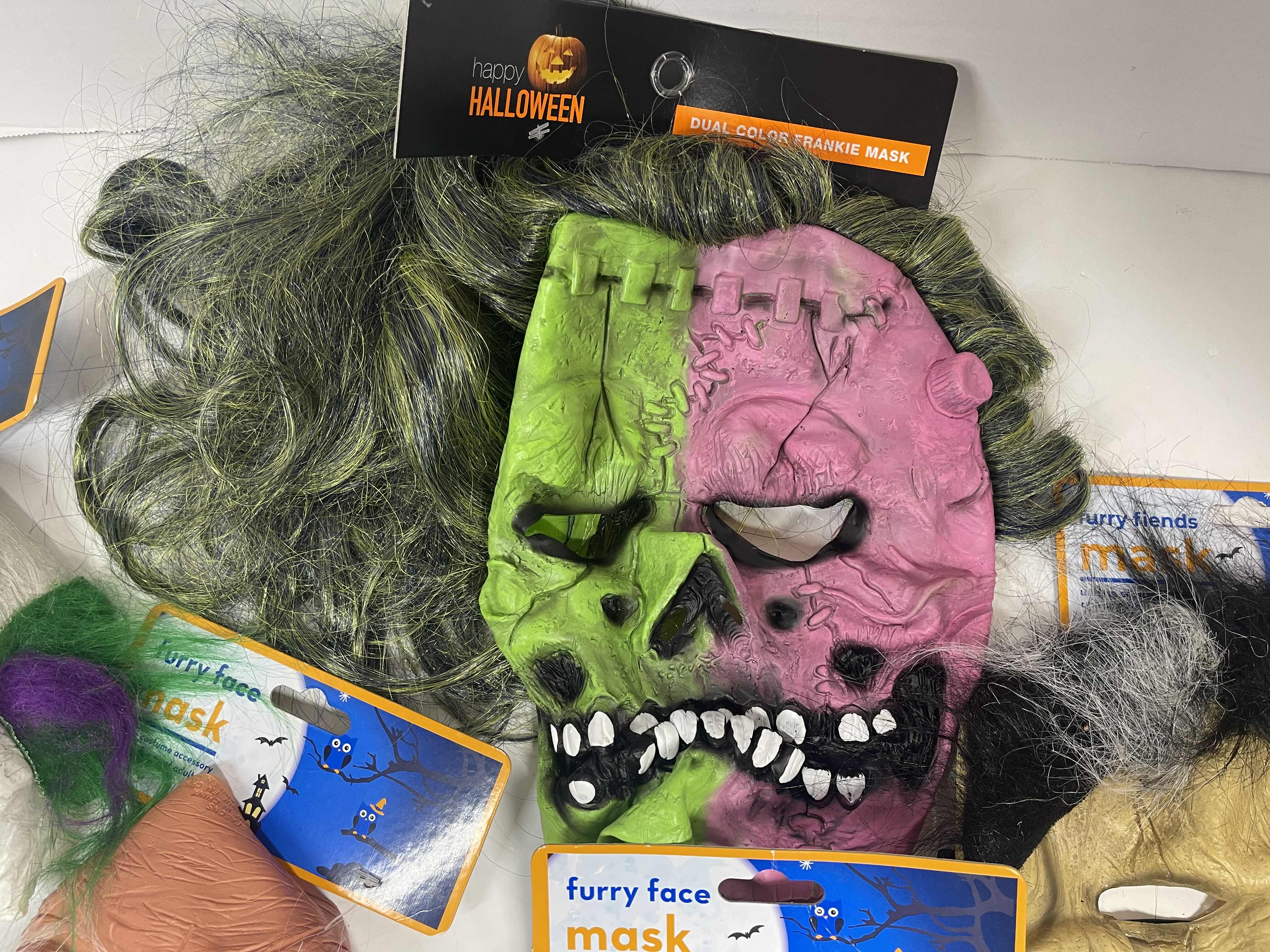 Photo 1 of HALLOWEEN RUBBER MASKS WITH HAIR (5) ONE SIZE FITS MOST ADULTS MSRP $65
