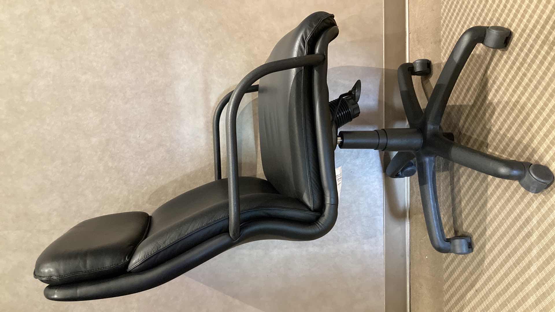 Photo 1 of ARCADIA BLACK FAUX LEATHER SWIVEL CHAIR 24.5” X 21” H44”