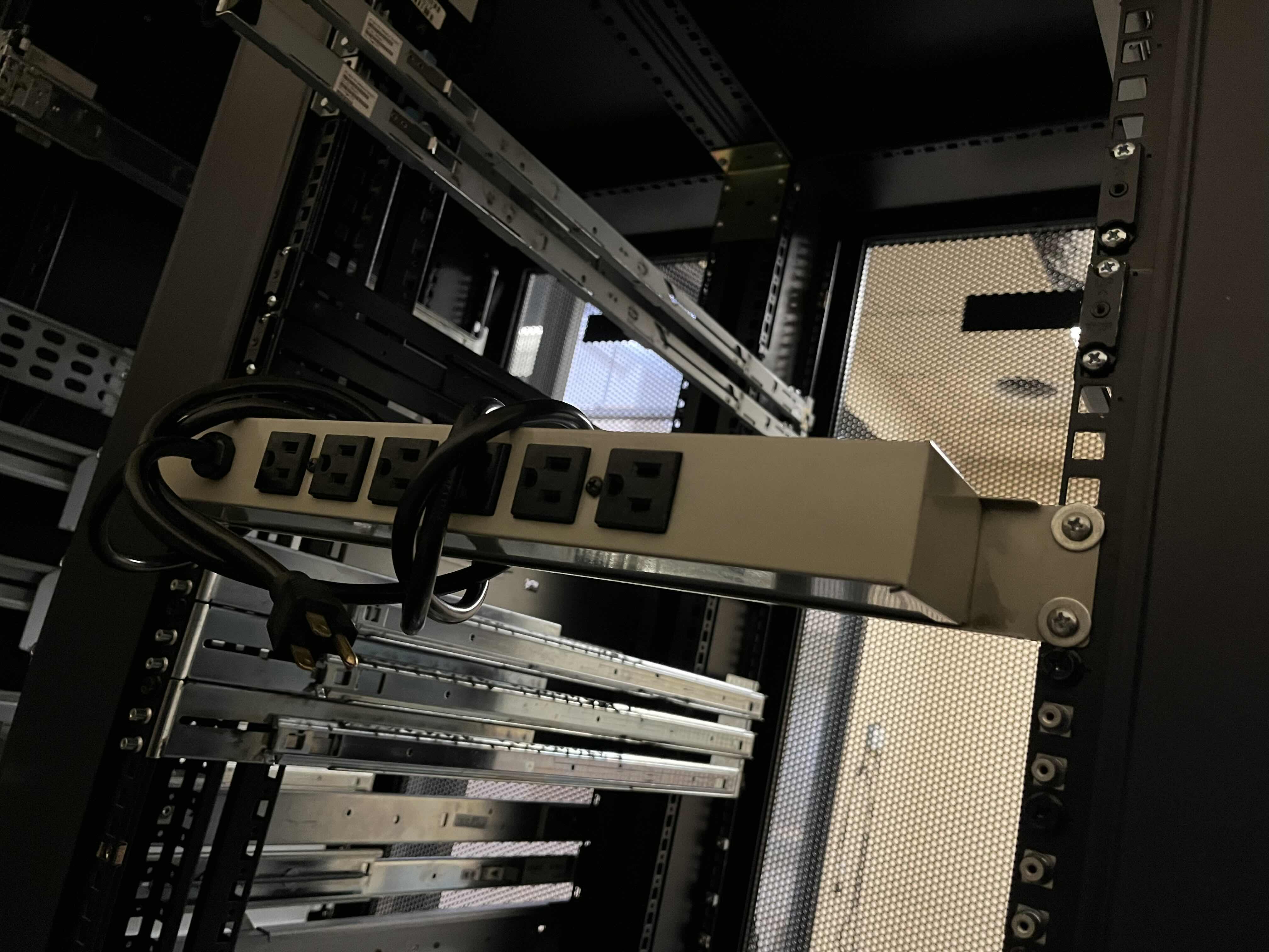 Photo 1 of DELL DOUBLE SIDED DOORS 3 RACK SET SERVER RACKS MODEL RML SERIAL NO. 7GMDA W 5 INSTALLED POWER STRIPS 88” X 45” H84.5” (READ NOTES)