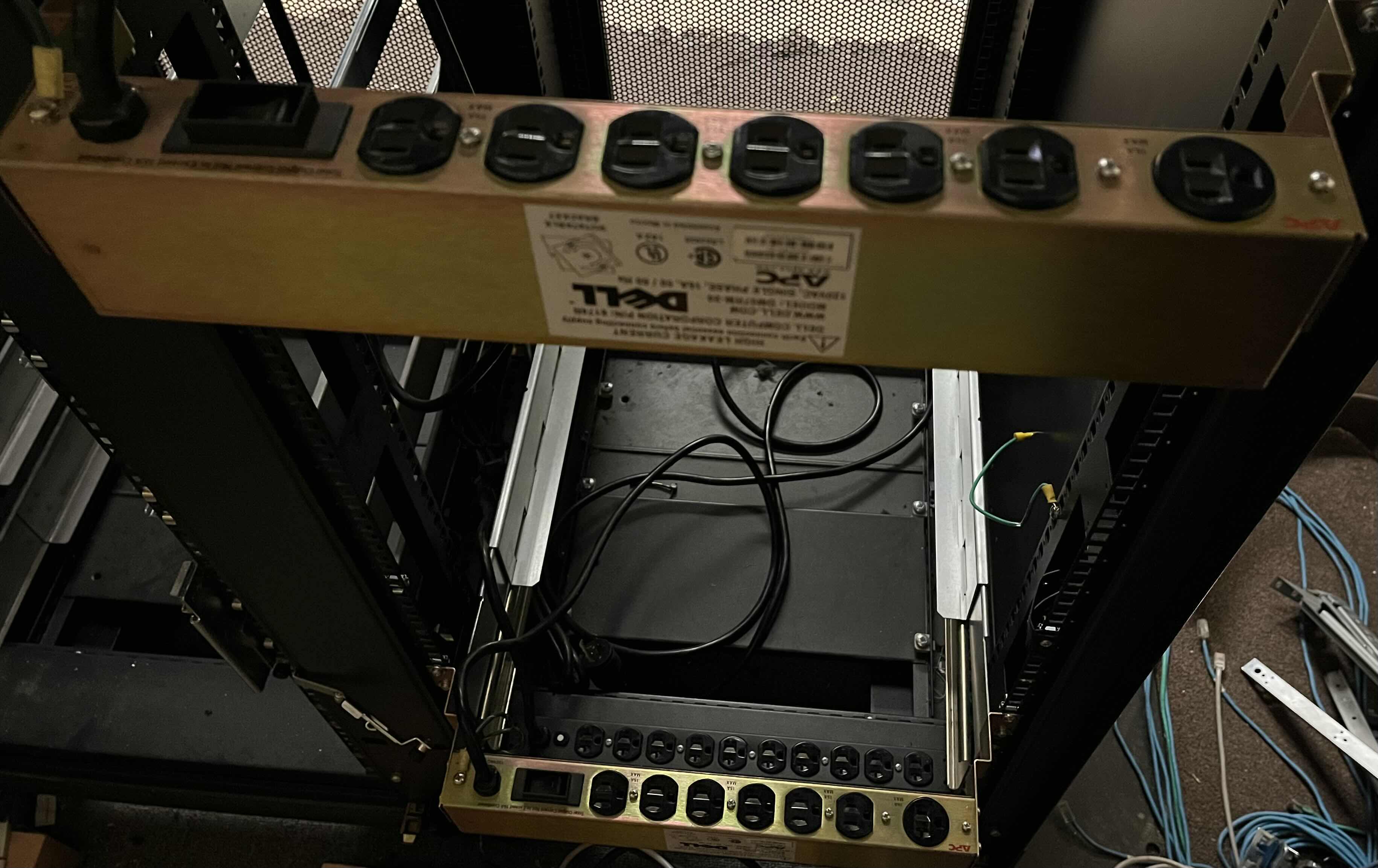 Photo 1 of DELL DOUBLE SIDED DOORS 3 RACK SET SERVER RACKS MODEL RML SERIAL NO. 7GMDA W 5 INSTALLED POWER STRIPS 88” X 45” H84.5” (READ NOTES)