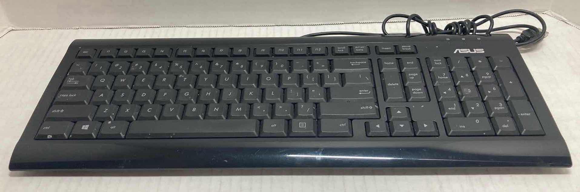 Photo 1 of ASUS COMPUTER KEYBOARD MODEL KB73211