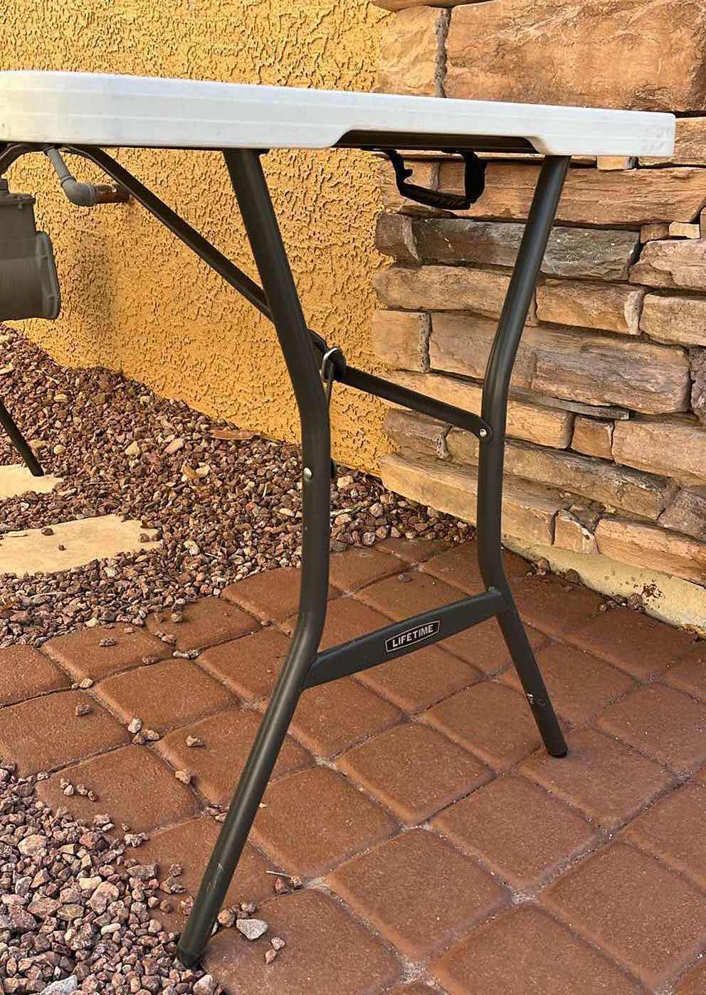 Photo 1 of LIFETIME 5FT FOLDING TABLE MODEL 80356