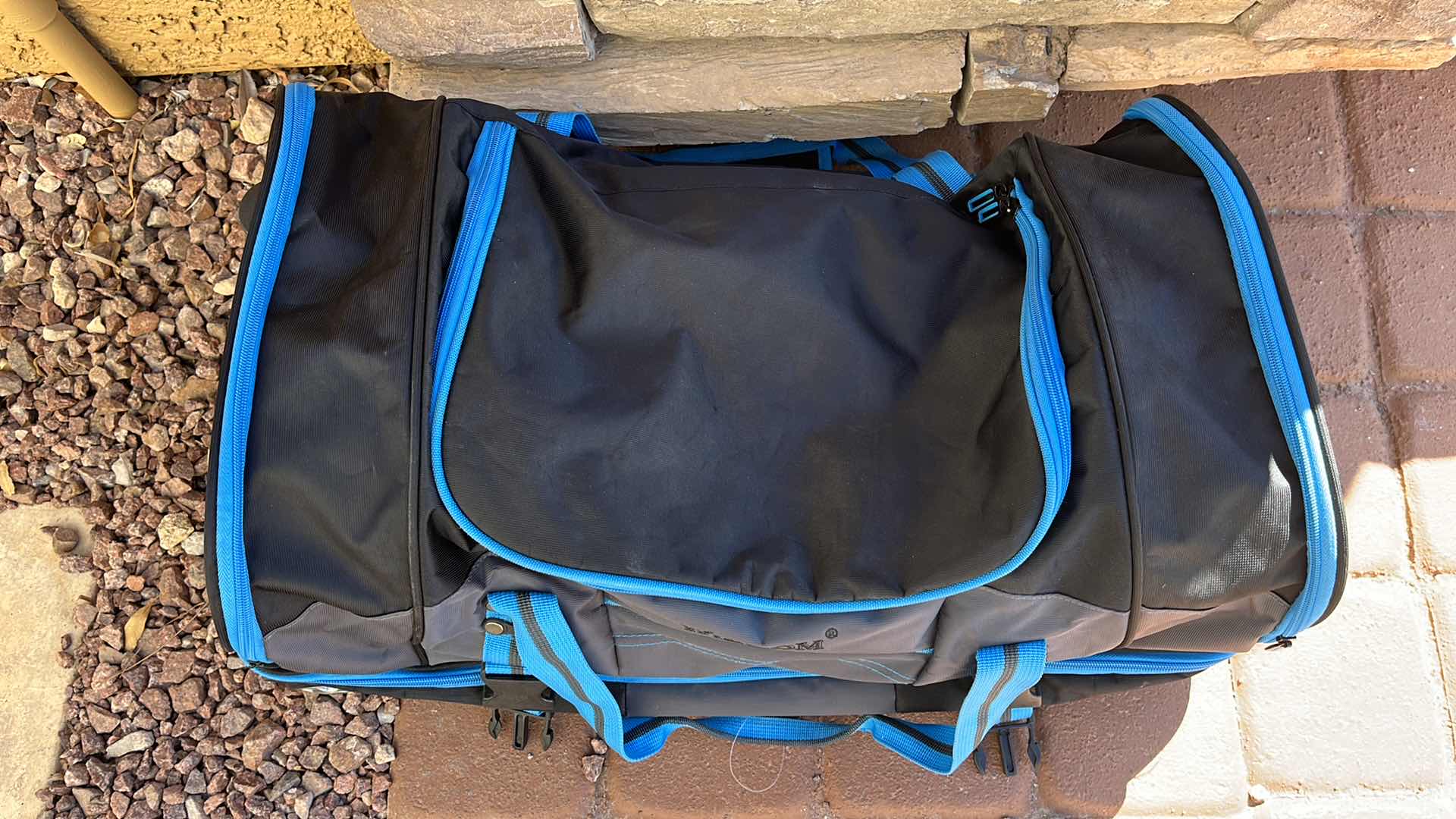 Photo 1 of WISDOM CARRY-ON ROLLING DUFFEL BAG