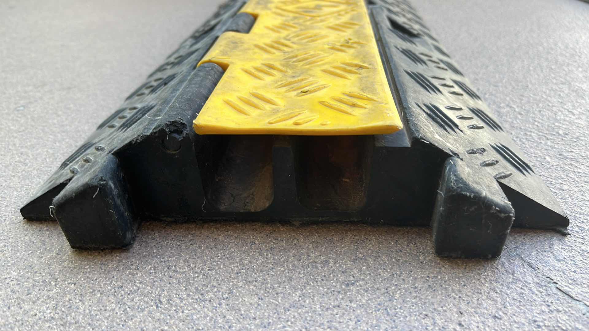 Photo 1 of GUARDIAN RUBBER 2 CHANNEL CABLE/CORD PROTECTOR 40” X 10” H2”