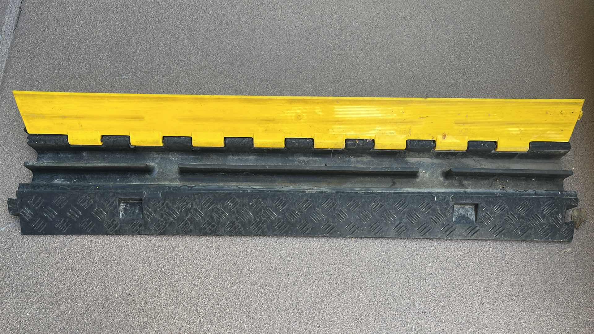 Photo 1 of GUARDIAN RUBBER 2 CHANNEL CABLE/CORD PROTECTOR 40” X 10” H2”