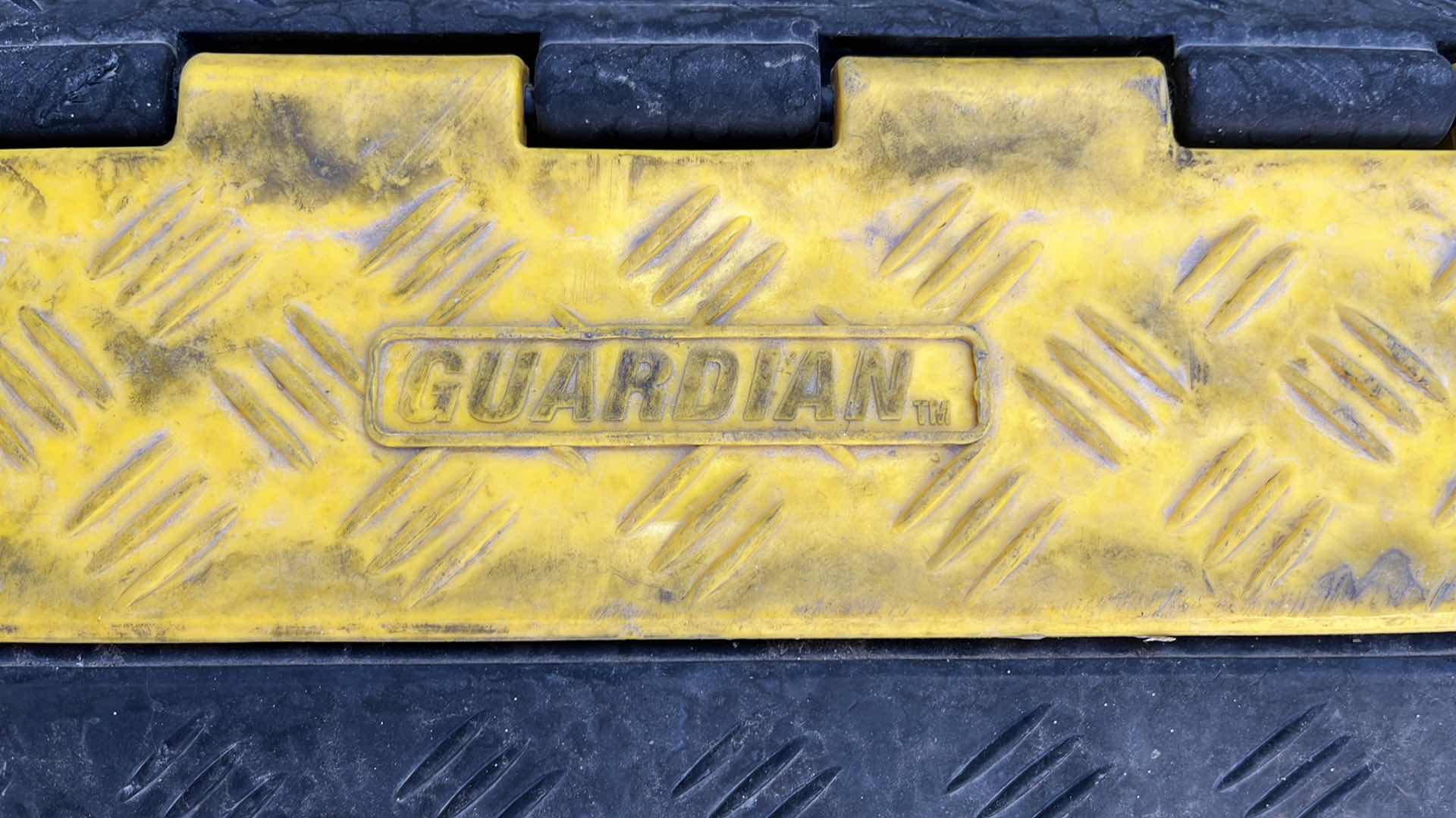 Photo 1 of GUARDIAN RUBBER 2 CHANNEL CABLE/CORD PROTECTOR 40” X 10” H2”