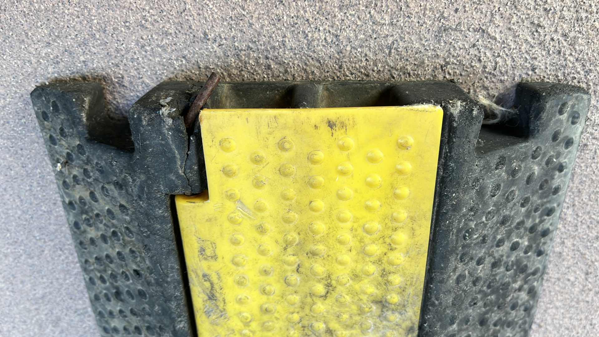 Photo 1 of RUBBER 2 CHANNEL CABLE/CORD PROTECTOR 39.5” X 9.5” H2”