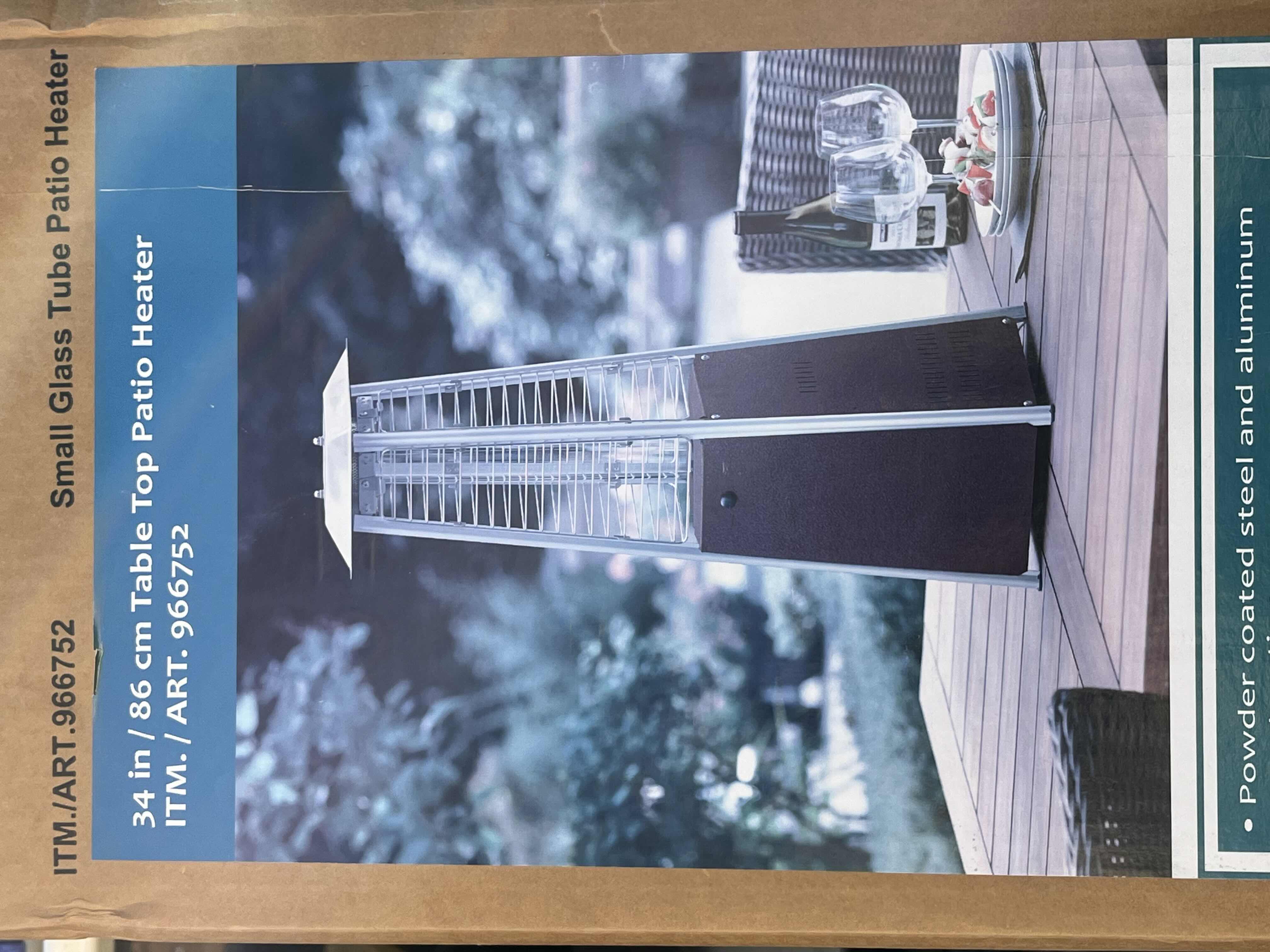 Photo 1 of COSTCO CORP PORTABLE GLASS TUBE GAS TABLE TOP PATIO HEATER 10” X 10” H34”