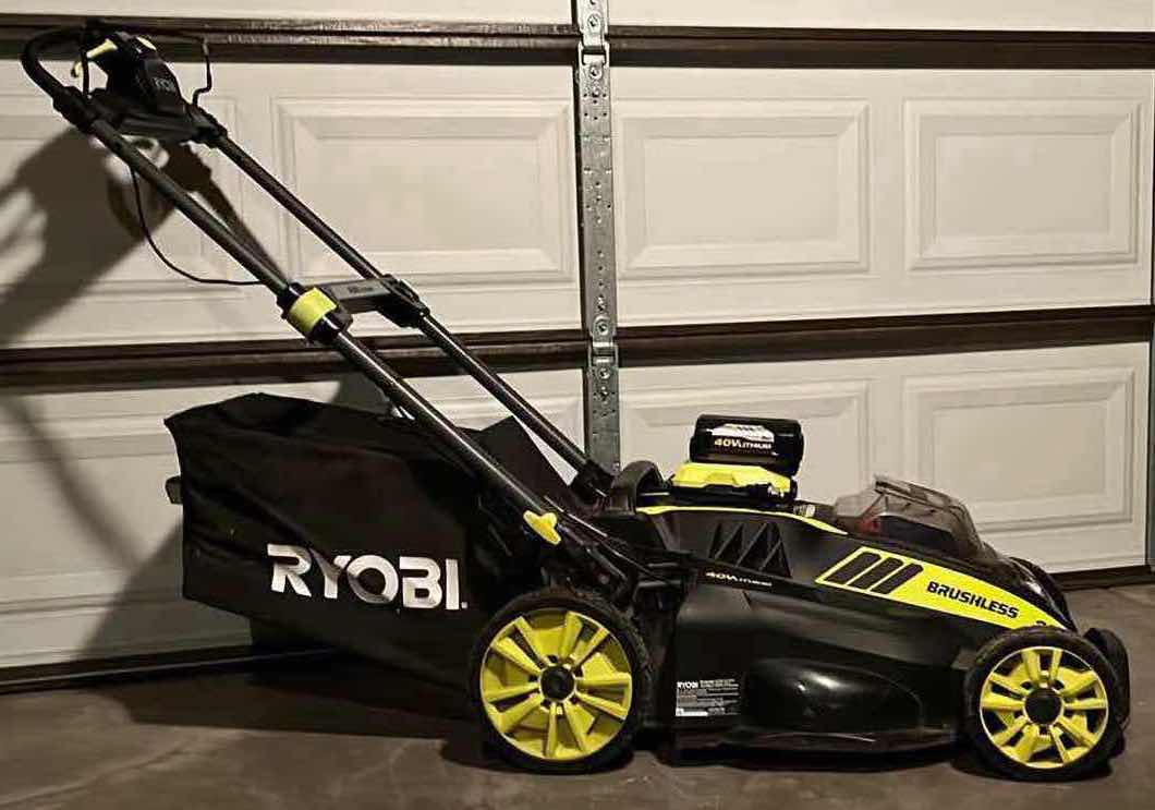 Photo 1 of RYOBI BRUSHLESS SELF PROPELLED ELECTRIC LAWNMOWER W 40V LITHIUM CHARGER MODEL RY40109