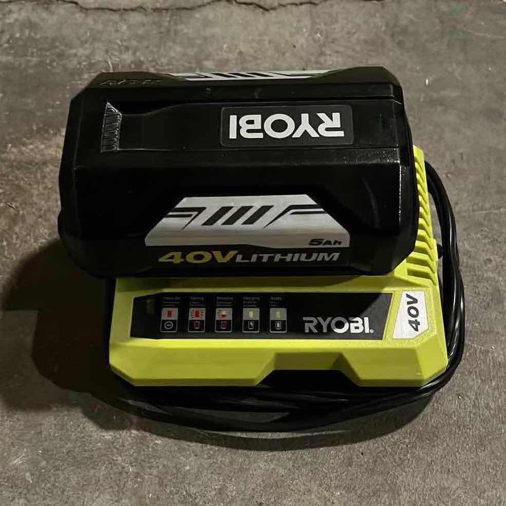 Photo 1 of RYOBI BRUSHLESS SELF PROPELLED ELECTRIC LAWNMOWER W 40V LITHIUM CHARGER MODEL RY40109