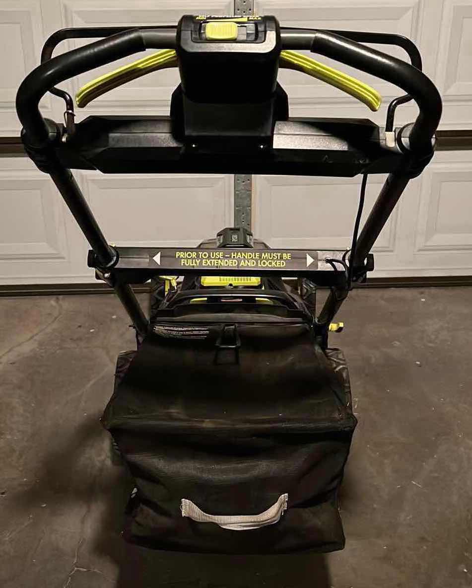 Photo 1 of RYOBI BRUSHLESS SELF PROPELLED ELECTRIC LAWNMOWER W 40V LITHIUM CHARGER MODEL RY40109