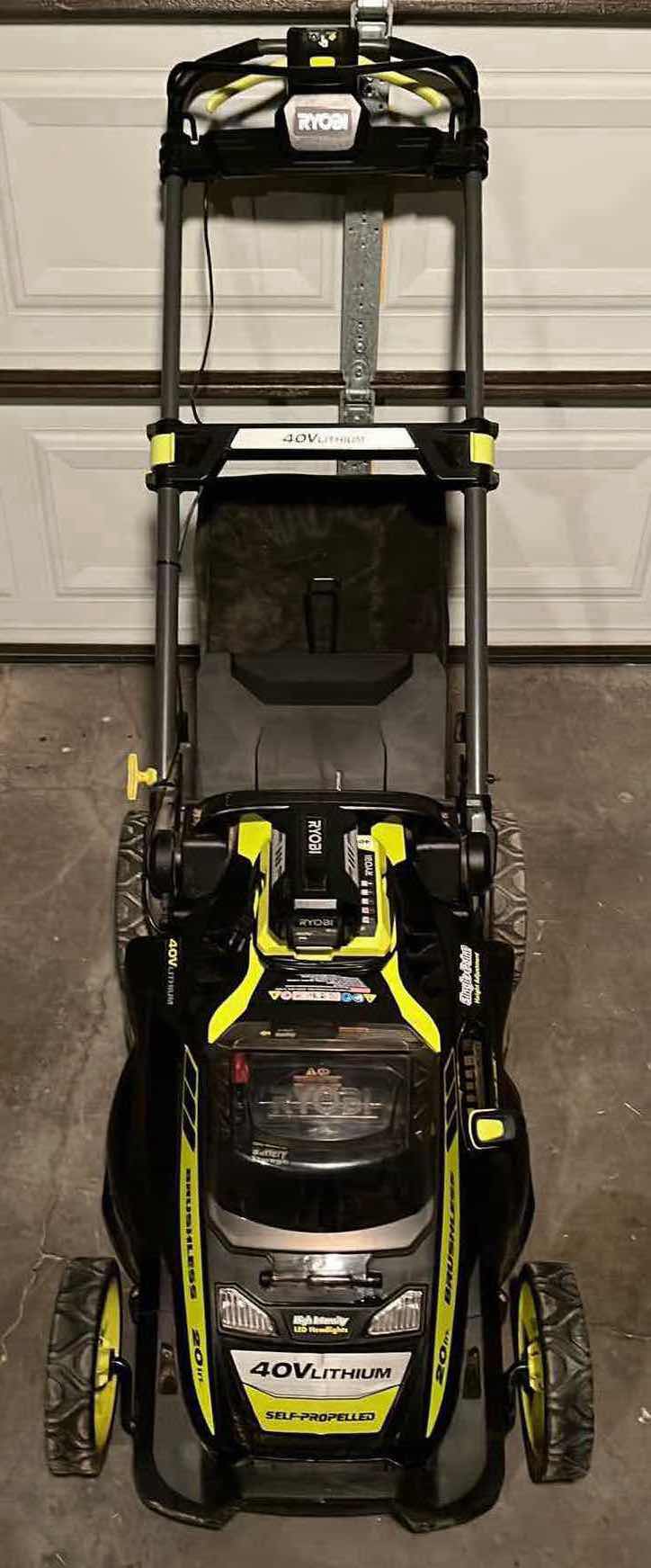 Photo 1 of RYOBI BRUSHLESS SELF PROPELLED ELECTRIC LAWNMOWER W 40V LITHIUM CHARGER MODEL RY40109