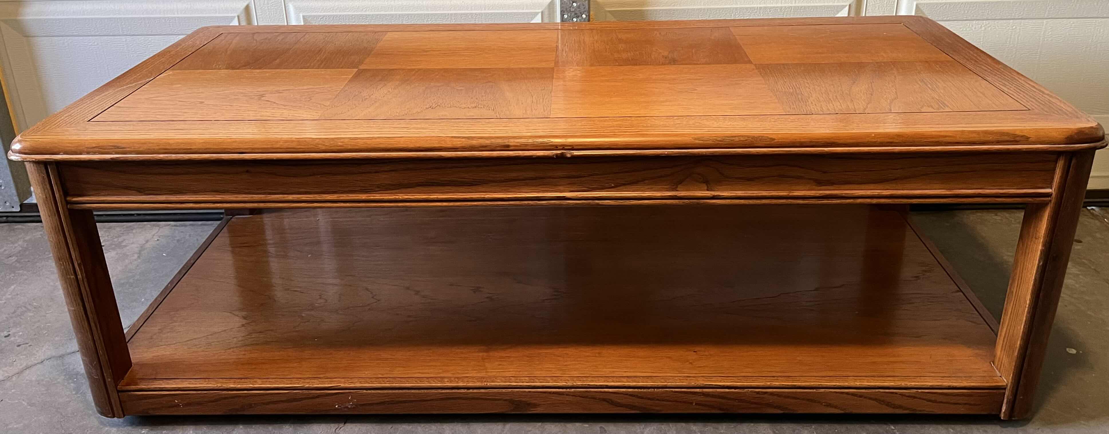 Photo 1 of OAK WOOD FINISH ROLLING COFFEE TABLE 52” X 24” H17”