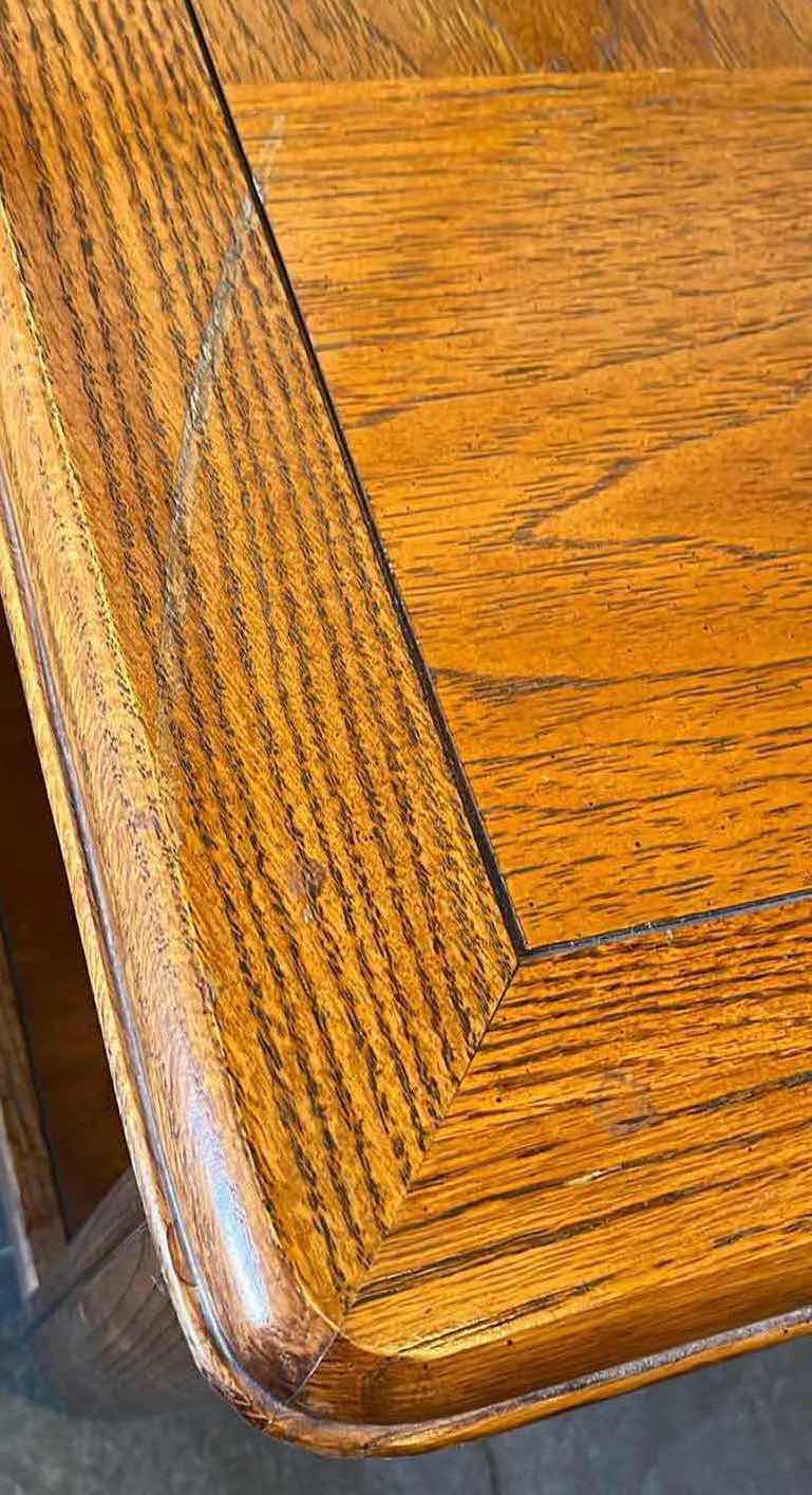 Photo 1 of OAK WOOD FINISH ROLLING COFFEE TABLE 52” X 24” H17”