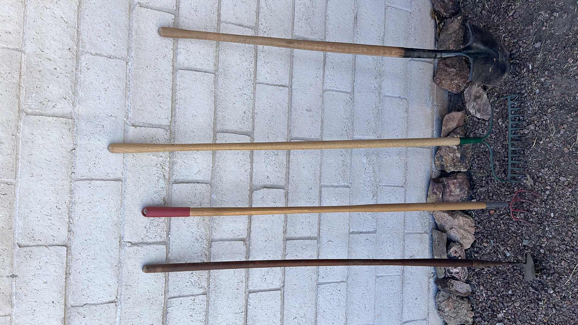 Photo 1 of YARD & GARDEN TOOLS (4)-BACK HOE, RAKES, SHOVEL