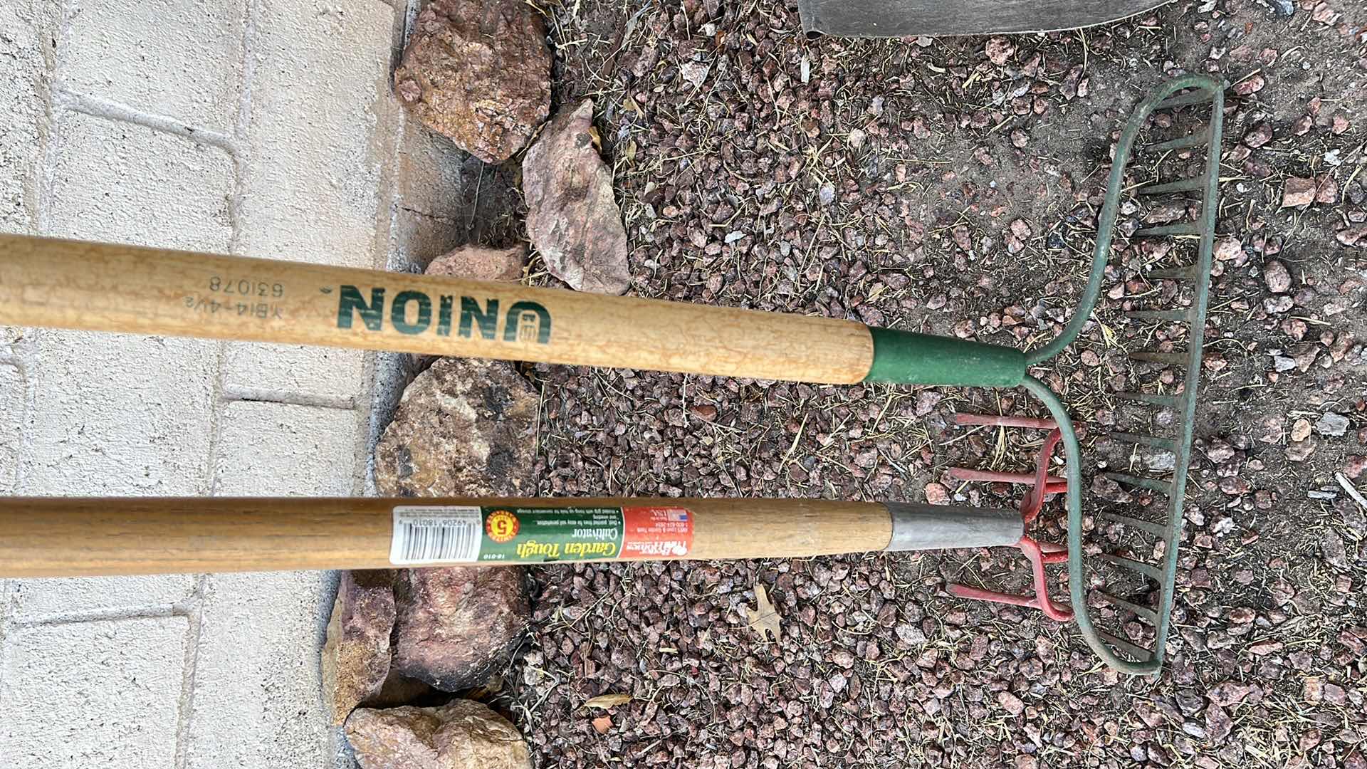 Photo 1 of YARD & GARDEN TOOLS (4)-BACK HOE, RAKES, SHOVEL