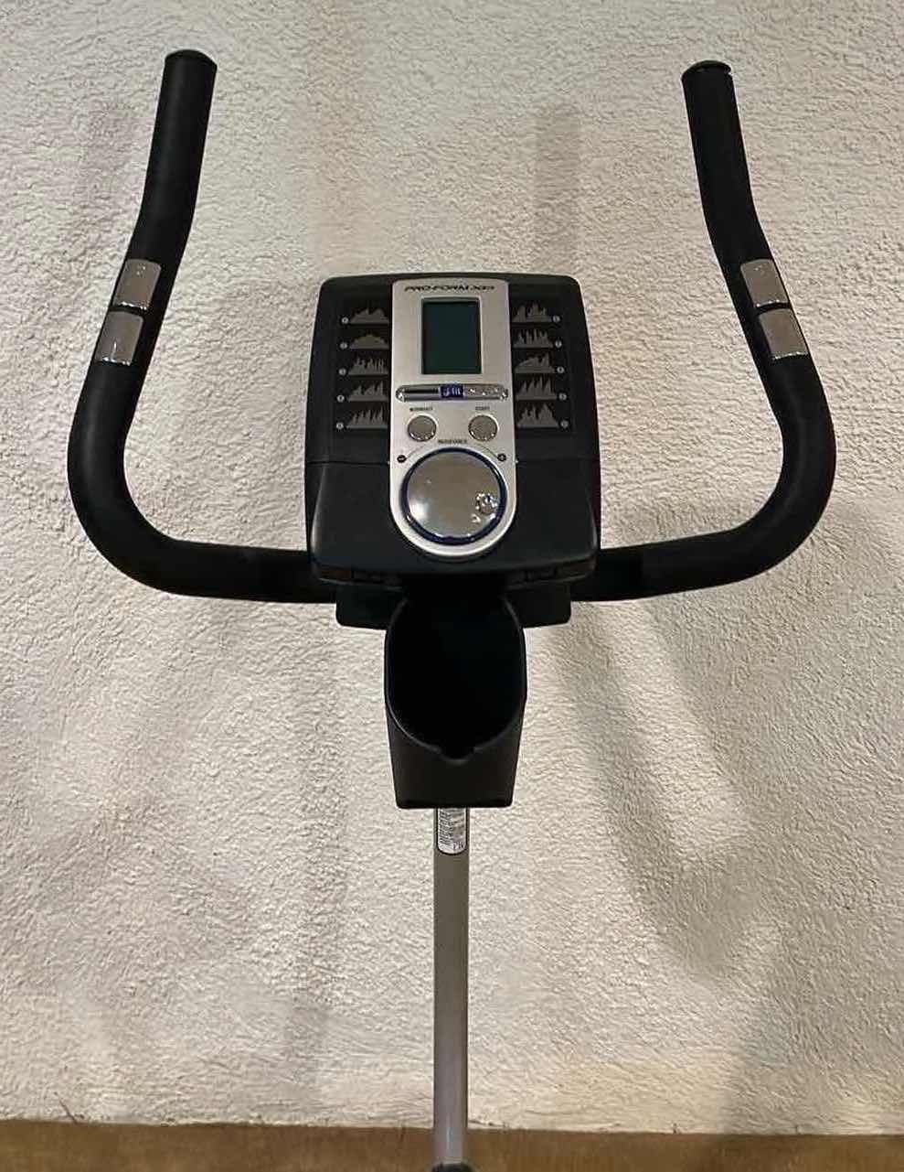 Photo 1 of PRO-FORM QUIET TECH DIGITAL RESISTANCE XP 185U STATIONARY EXERCISE BIKE (READ NOTES)