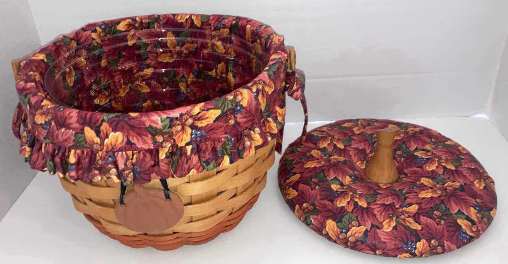 Photo 1 of LONGABERGER 1995 PUMPKIN SHAPE MAPLE WOOD BASKET W FALL FOLIAGE FABRIC LINER & BASKET PROTECTOR 9.25” X 9.25” H7.25”