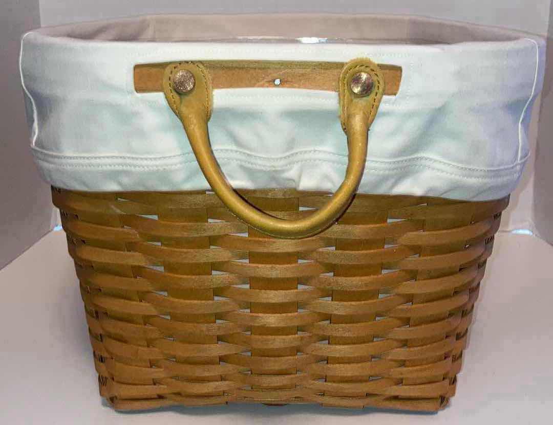 Photo 1 of LONGABERGER OVAL LAUNDRY MAPLE WOOD BASKET W WHITE FABRIC LINER & BASKET PROTECTOR 21” X 14.5” H10.75”