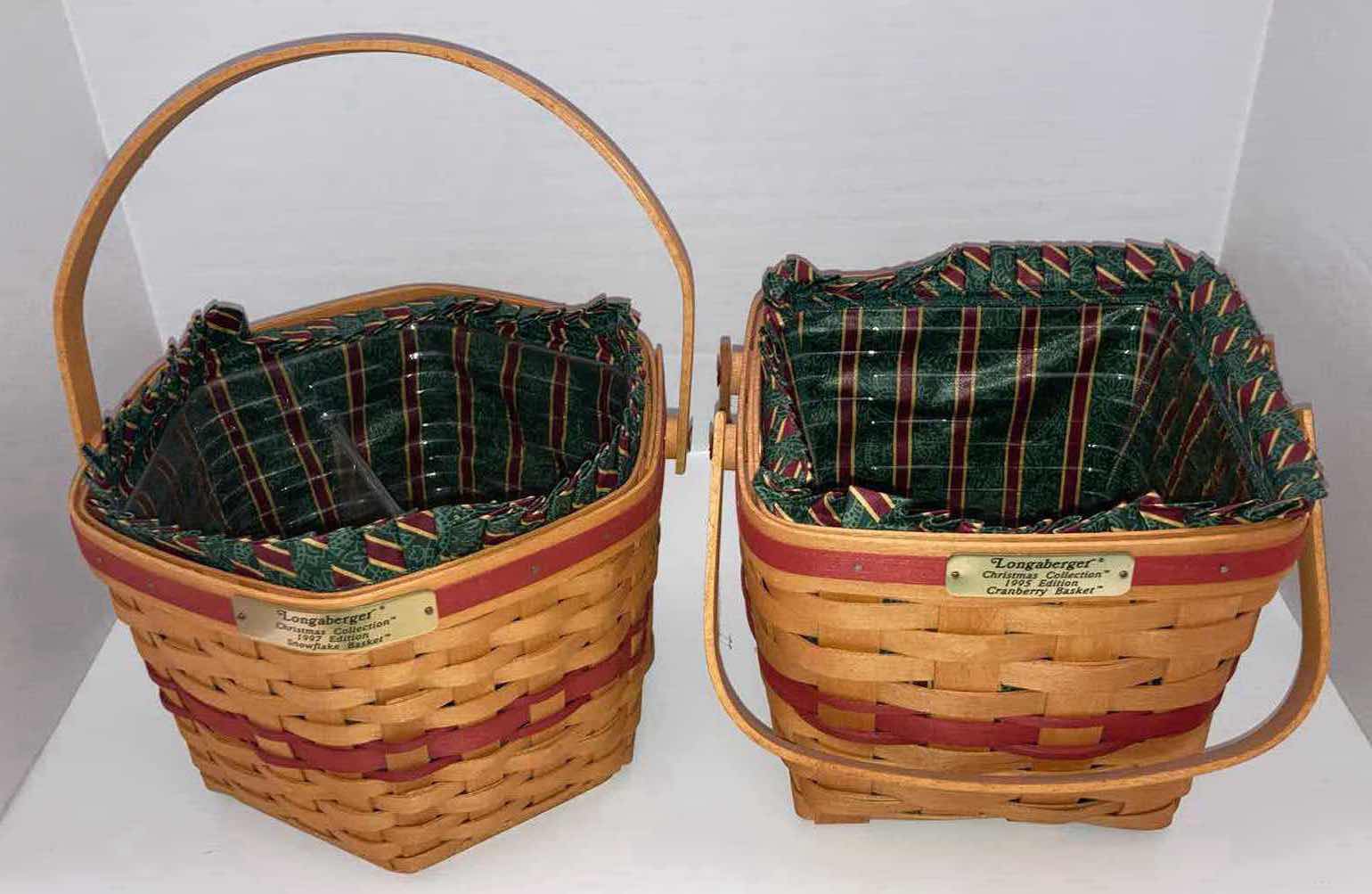Photo 1 of LONGABERGER CHRISTMAS COLLECTION 1997 SNOWFLAKE & CRANBERRY MAPLE WOOD BASKETS W CHRISTMAS STRIPED FABRIC LINER & BASKET PROTECTOR (9” X 9” H6.5” & 8.25” X 8.25” H7”)