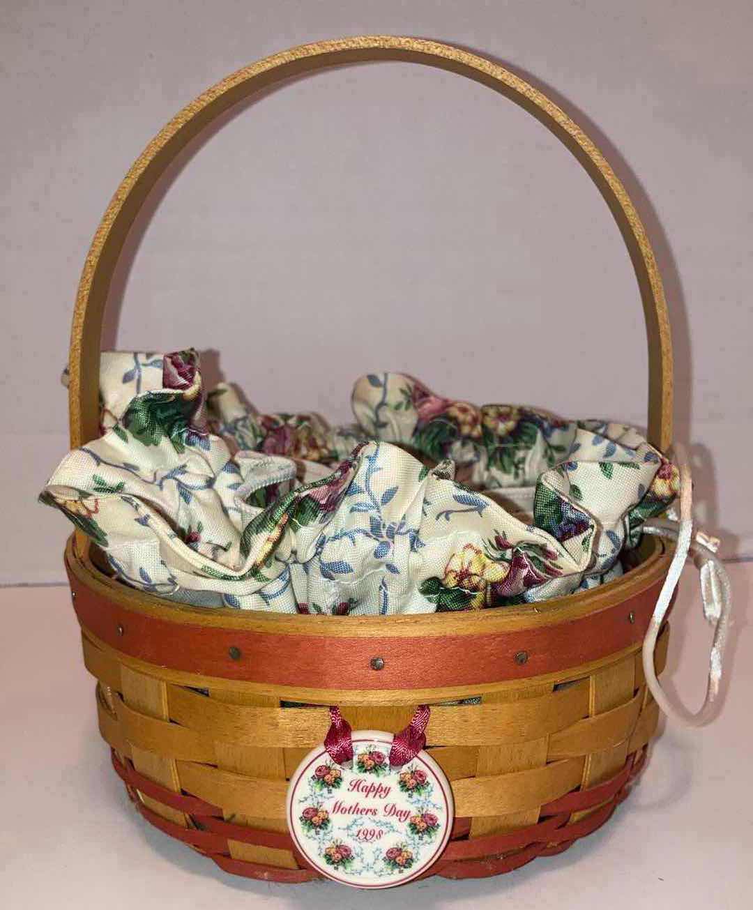 Photo 1 of LONGABERGER MOTHER’S DAY 2000 EARLY BLOSSOMS & 1998 MAPLE WOOD BASKETS W BLOSSOMS FABRIC LINER & BASKET PROTECTOR (10.75” X 7.5” H3” & 6.75” X 6.75” H3.25”)