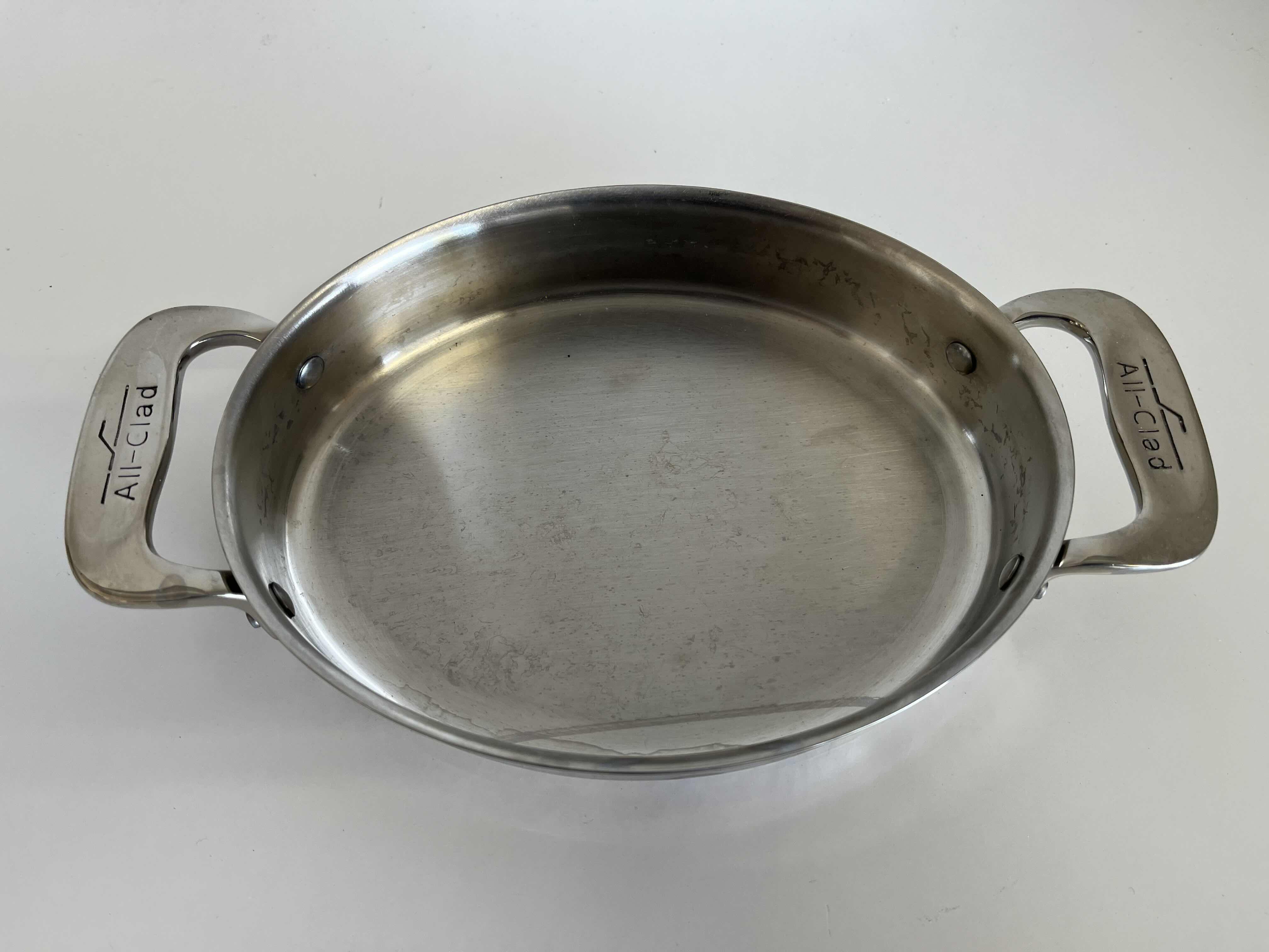 Photo 1 of ALL CLAD STAINLESS STEEL MINI OVAL BAKING PAN 5.5” X 7” H1.5”