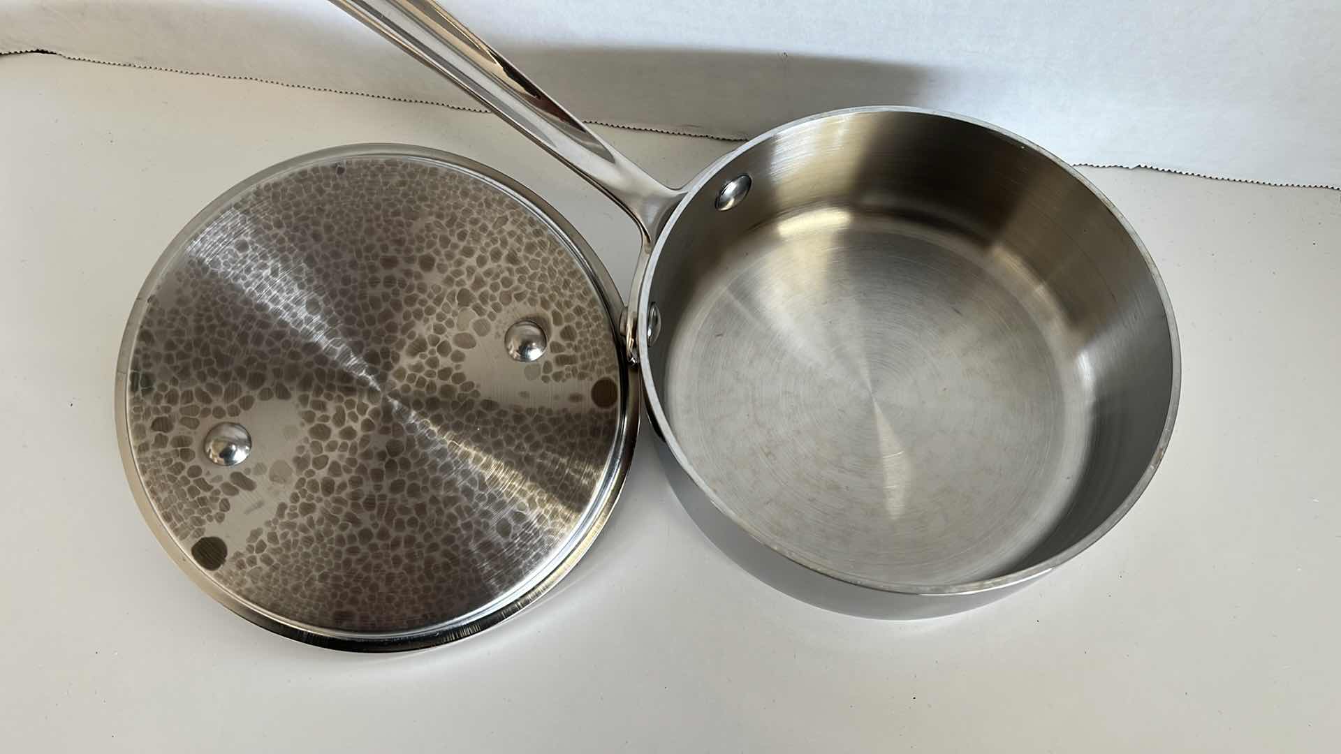 Photo 1 of ALL CLAD STAINLESS STEEL PAN W LID 6” X 2.25”