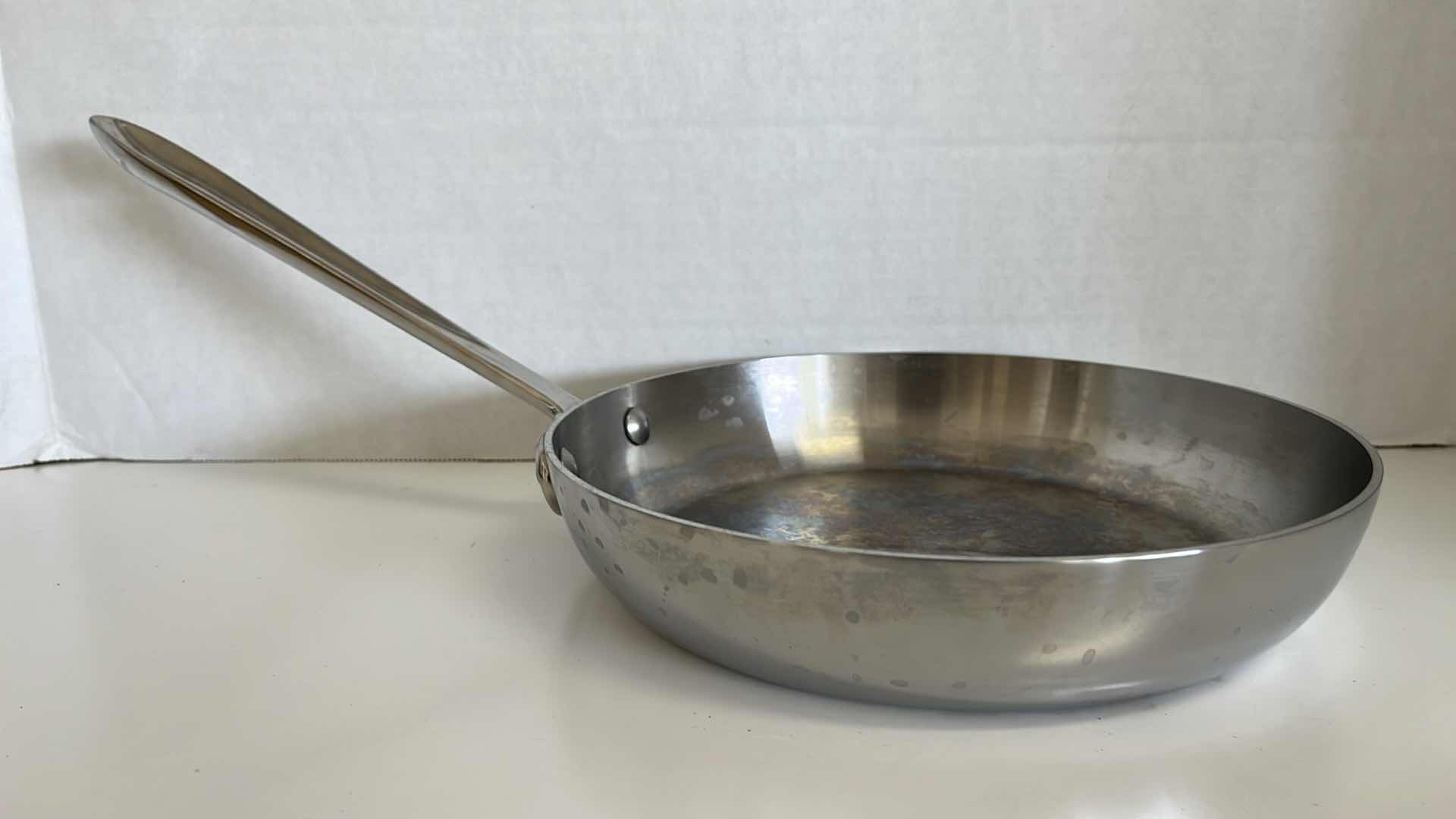 Photo 1 of   ALL CLAD STAINLESS STEEL SKILLET 9.5” X 1.75”