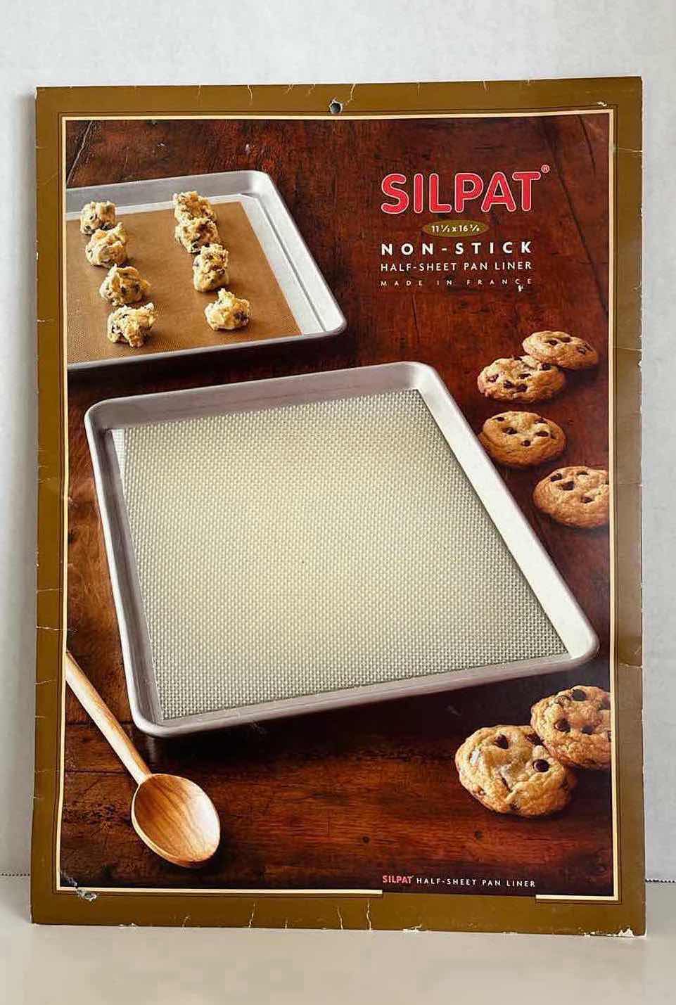 Photo 3 of BAKING SHEET PANS 16” X 11” H1” (2) W RESTING RACK & SILPAT NON-STICK PAN LINER
