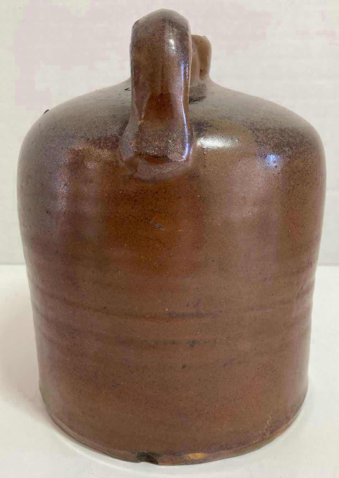 Photo 1 of ANTIQUE BROWN STONEWARE WHISKEY JUG 6” X H7.5”
